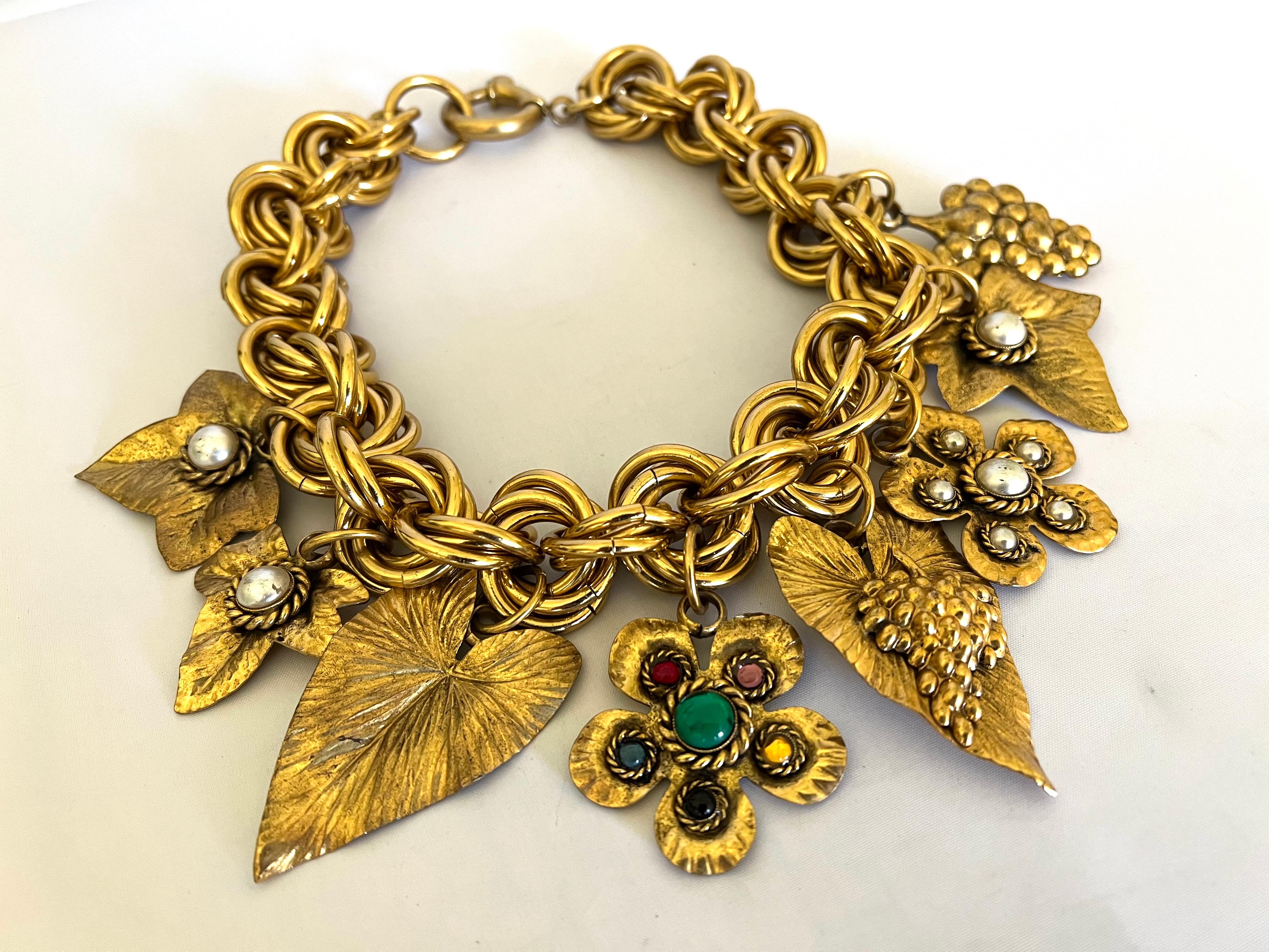 Vintage oversized charm necklace comprised of gilt metal 