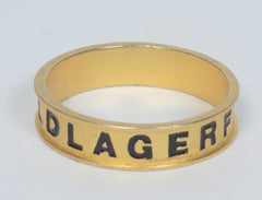 Bracciale sottile vintage "LAGERFELD" in oro zecchino e smalto, firmato Karl Lagerfeld