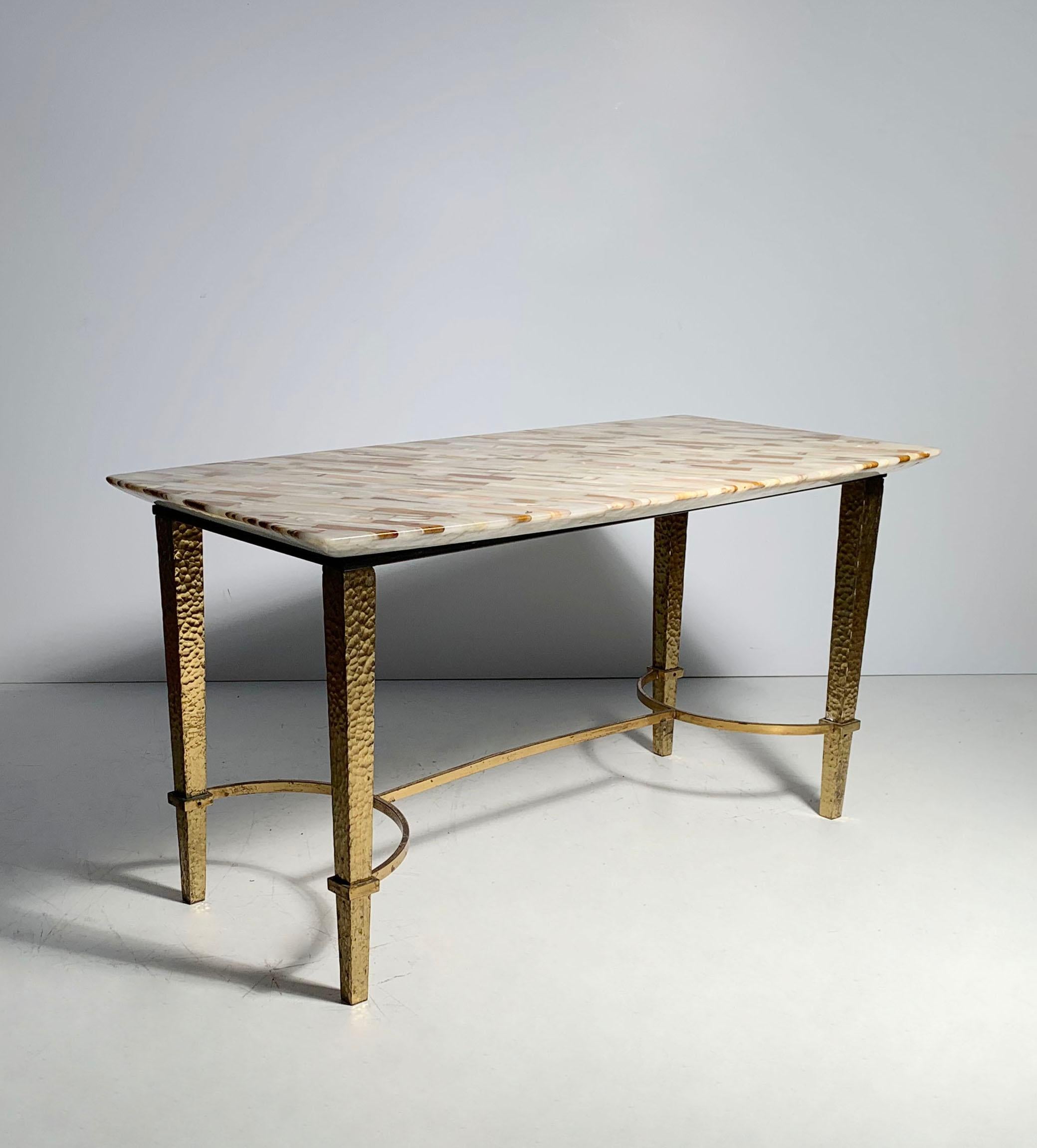 Vintage gilt / gilded hammered metal petite coffee table with stone top.

Manner of Andre Arbus , Jansen , Gilbert Poillerat 

 