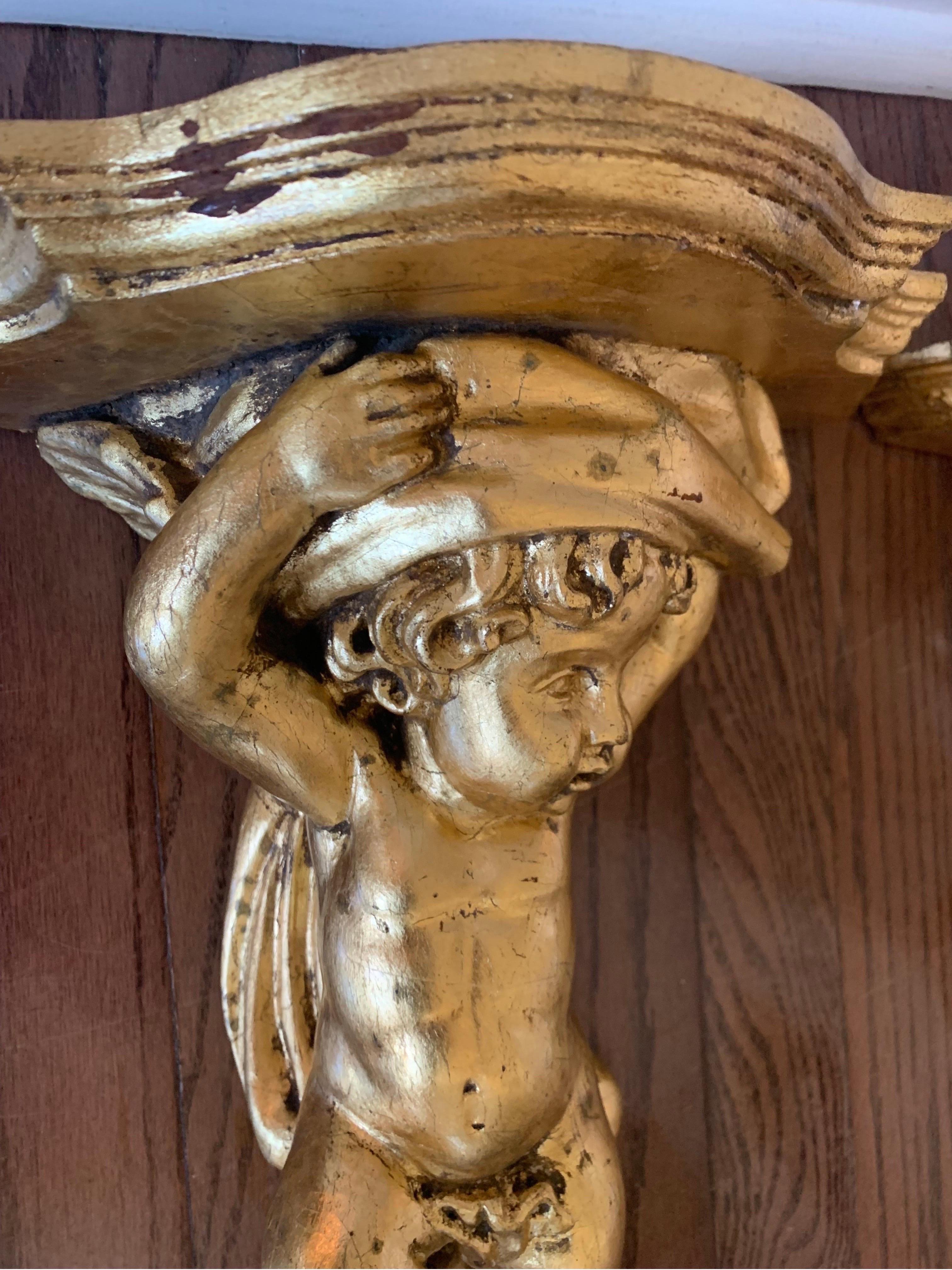 Vintage Gilt Hand Carved Putti Cherub Wall Bracket Shelves, a Pair In Good Condition For Sale In Doylestown, PA