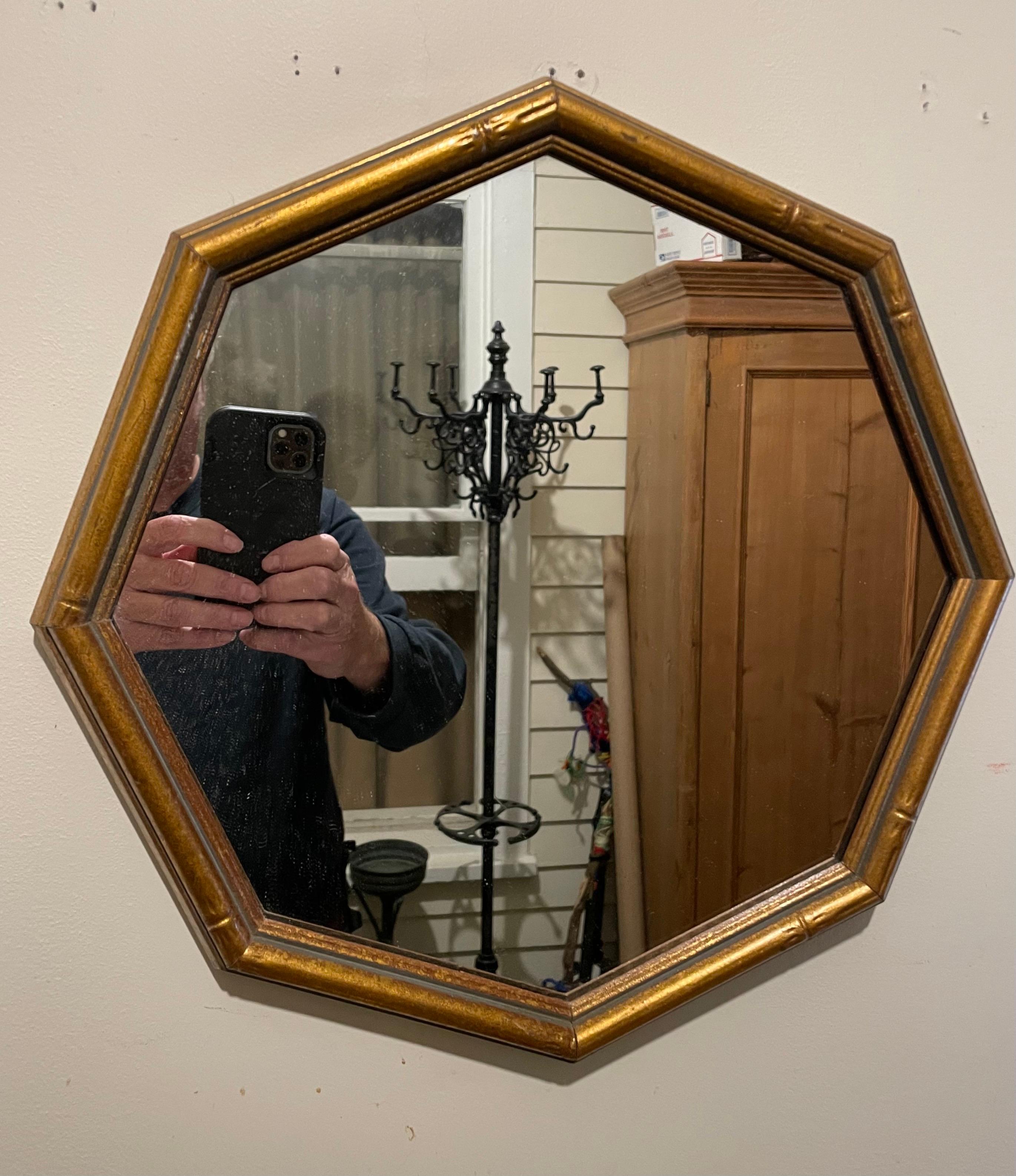 Gilt octagon Faux bamboo mirror. Measures 13.25