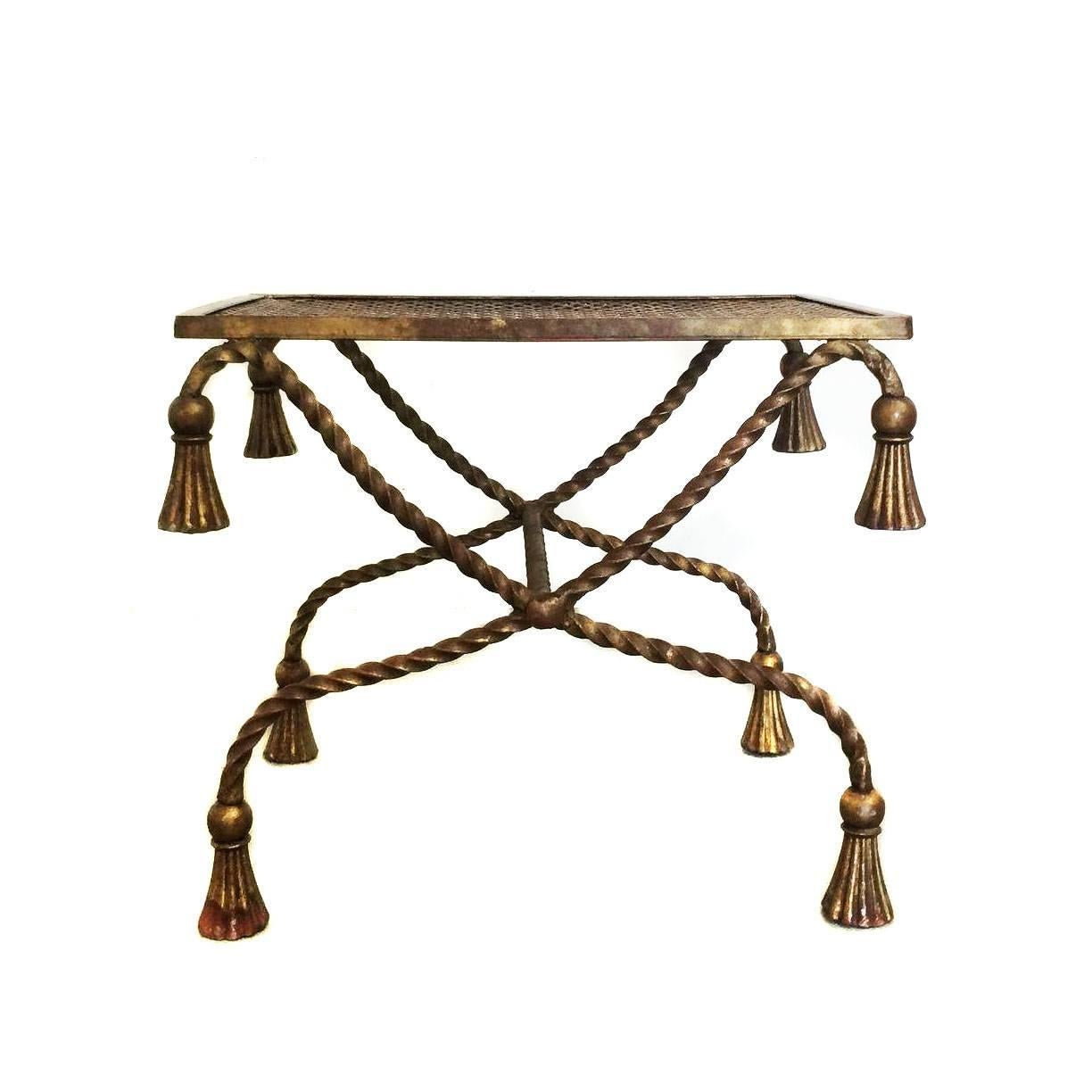 This lovely bench is a classic! Gilt metal in the form of rope with large tassels on the ends. Cushion is in good shape though has some wear due to age.
Measurements: 19.5