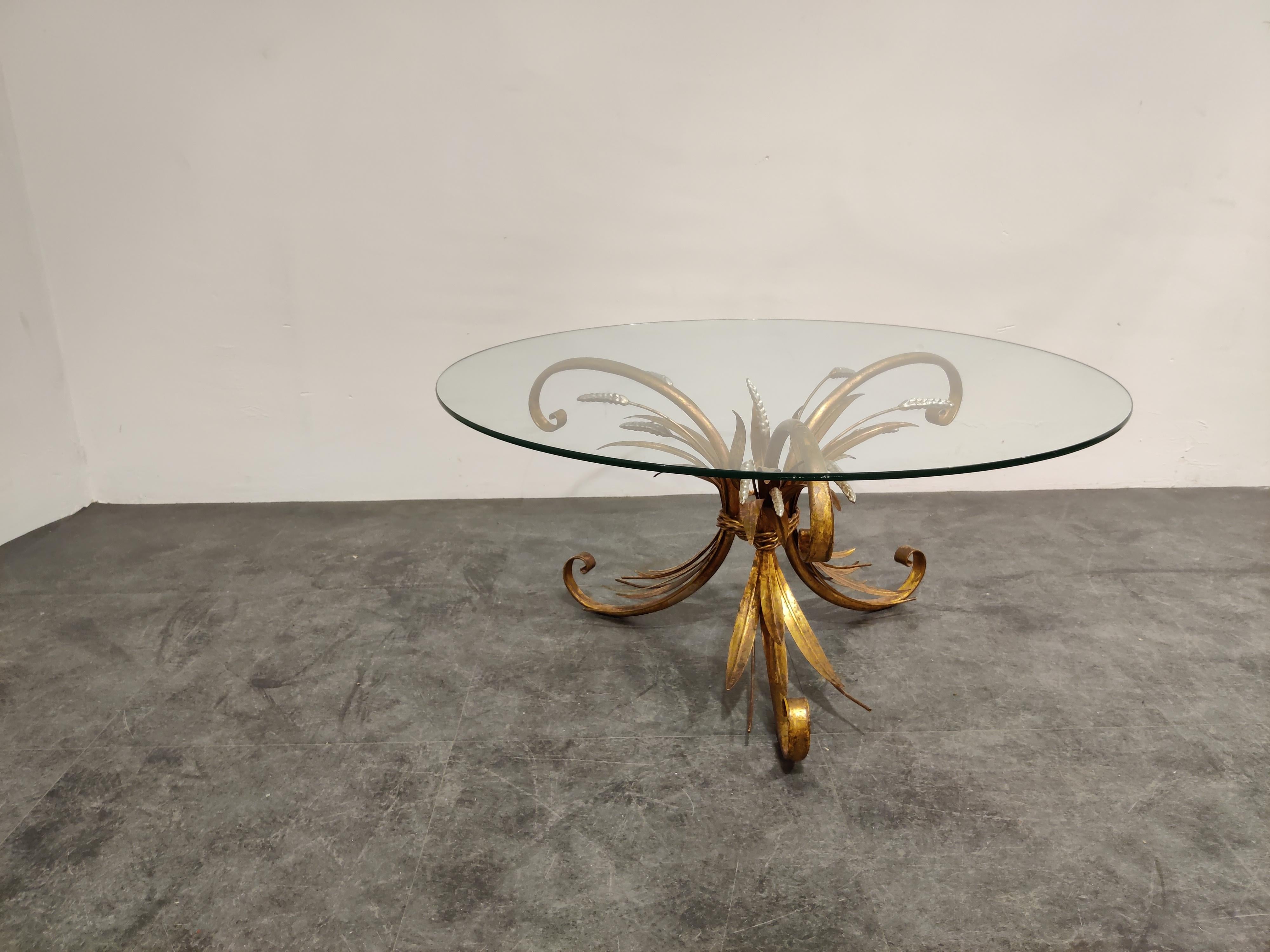 Vintage tripod Coco Chanel coffee table.

The table is named after the famous fashion queen Gabrielle Bonheur Chanel.

Made of gilt metal with a round glass top.

The table is in very good vintage condition beautiful patina.

1960s -