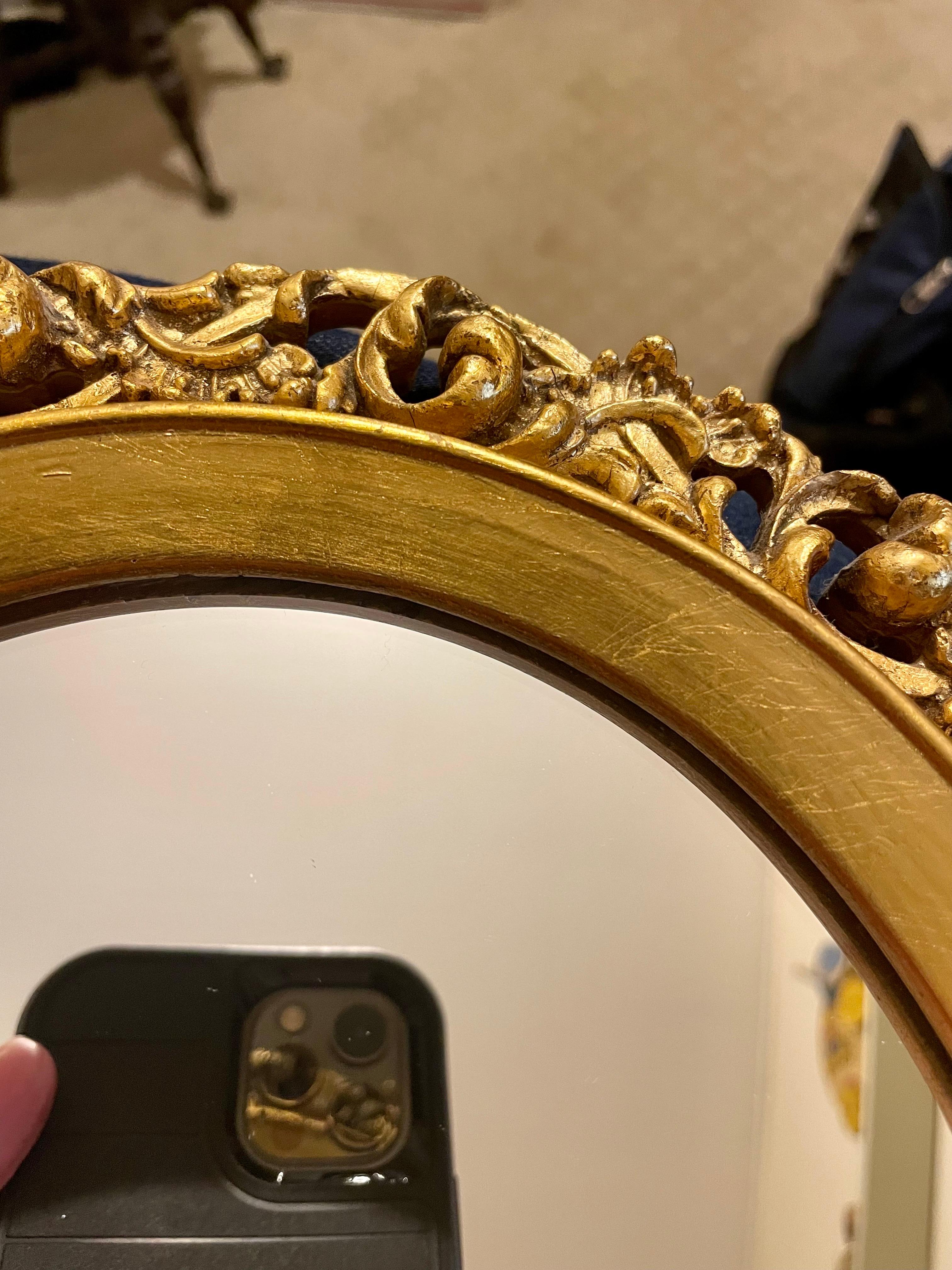 20th Century  Vintage Gilt Oval Carved Italian Mirror For Sale