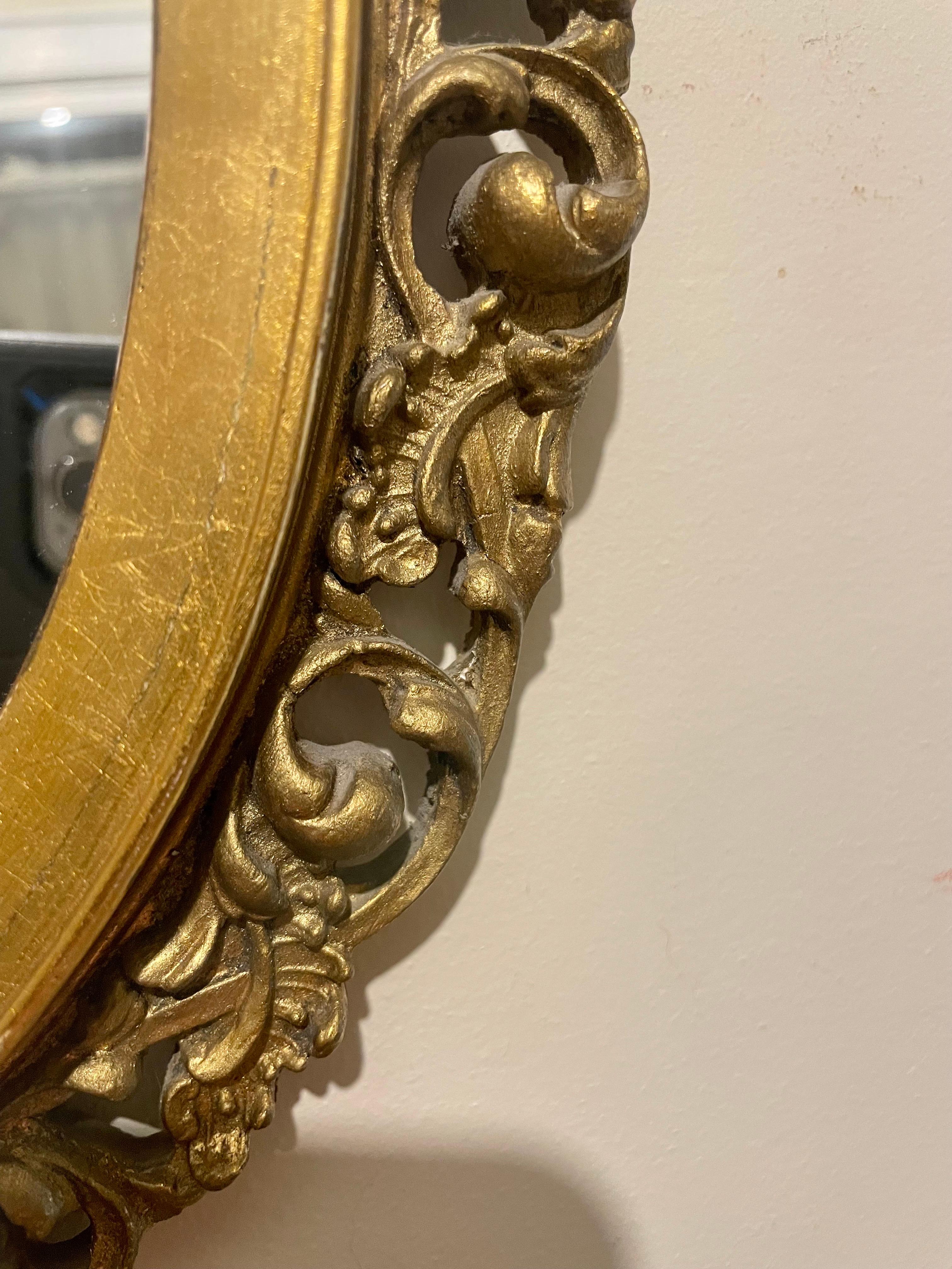 20th Century  Vintage Gilt Oval Carved Italian Mirror For Sale