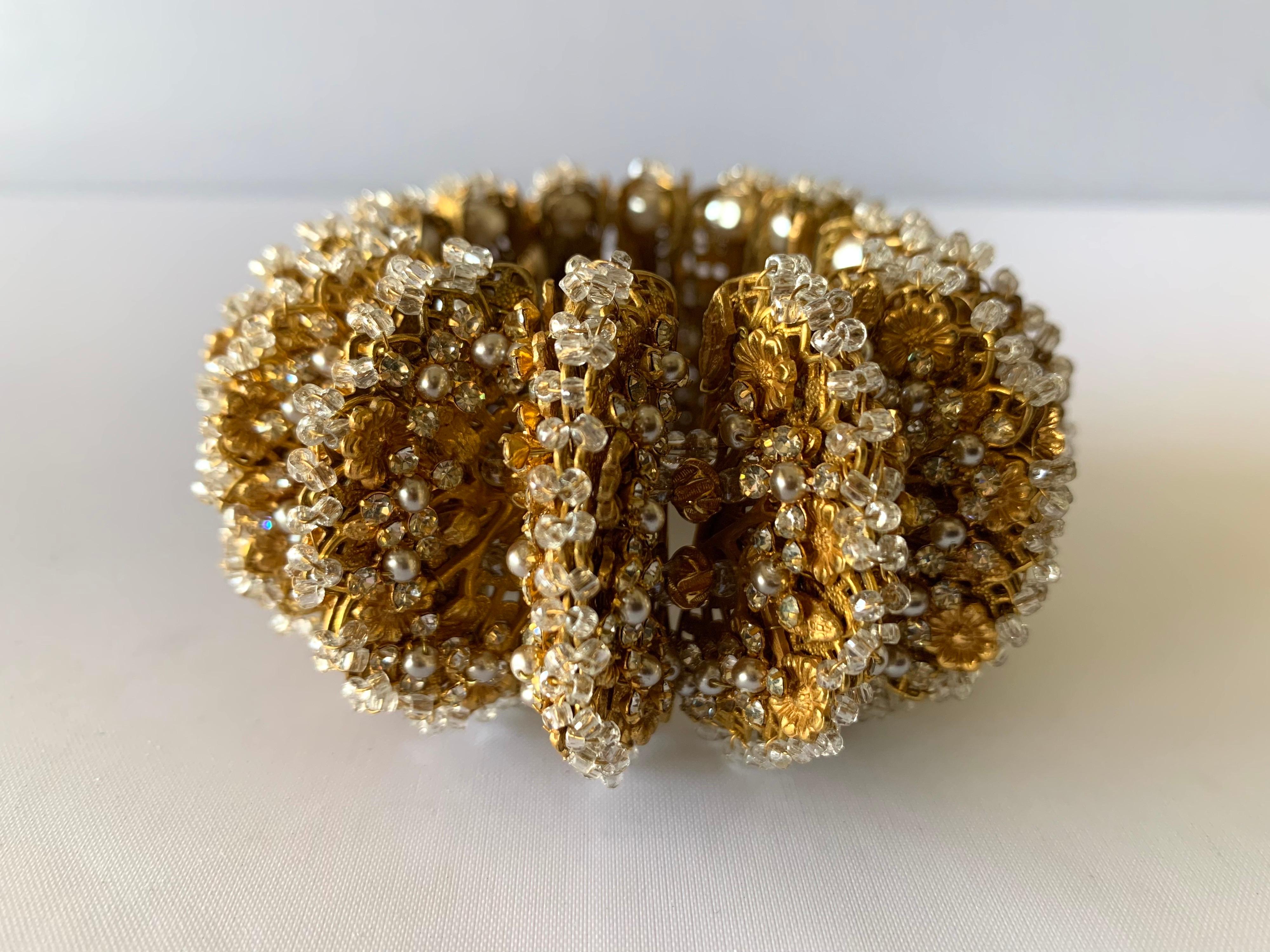 Exquisite vintage architectural chunky wrap bracelet, comprised out of gilt metal 