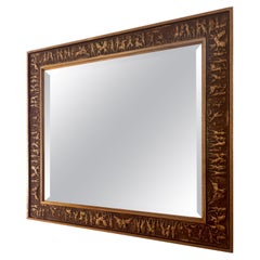 Specchio d'epoca in legno dorato con intricati intagli  Decorazioni da parete