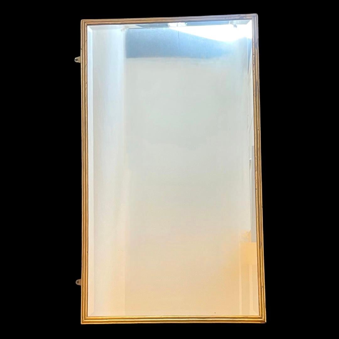 Our vintage gold gilt wooden wall mirror, is an exquisite piece that features bevelled glass that captures and enhances light, infusing your room with a luminous ambiance.

Its simple yet elegant design embodies the ethos of 