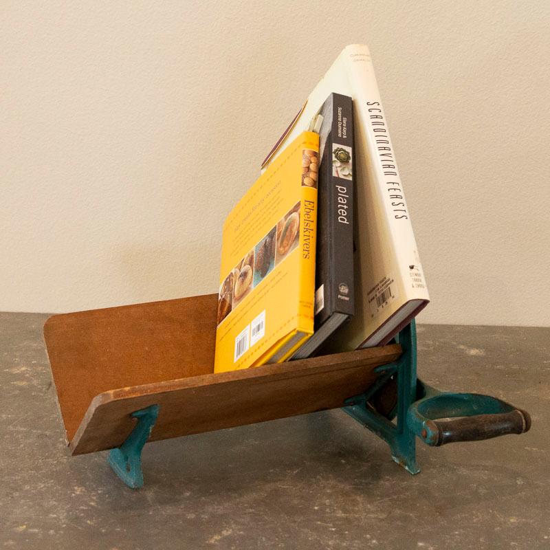 Denmark is famous for smorgasbord, an open-faced sandwich served on thinly sliced, dense rye bread. This style of wood and cast iron bread cutter was used throughout Denmark in the early 1900s to slice their favorite bread. As this is an authentic