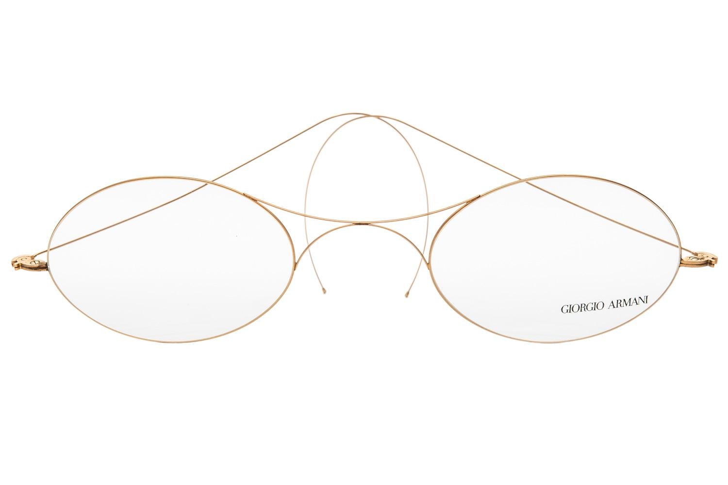 These fun and fabulous Classic vintage Armani frame glasses were probably made for promotional or store display purposes. The giant frame is in a gold colored metal while the lenses are acrylic and imprinted with Giorgio Armani in bold black