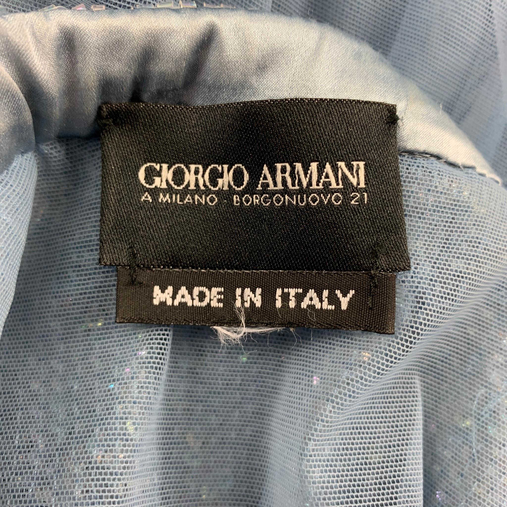 Vintage GIORGIO ARMANI body suit comes in a light blue beaded material with a mesh panel featuring side zipper and a snap button liner closure. Made in Italy.

Good Pre-Owned Condition. Missing size tag.

Measurements:

Bust: 34 in.
Length:  20.5