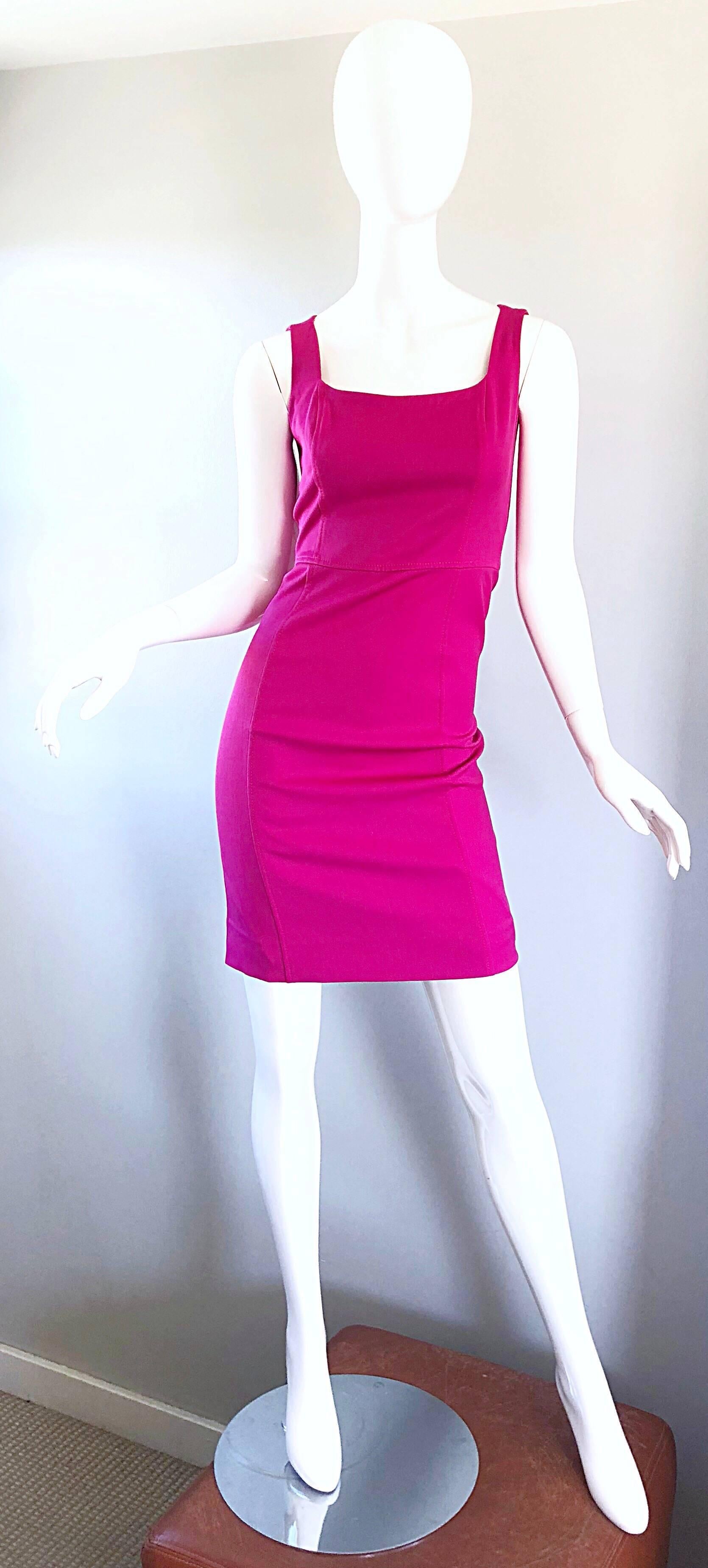Chic 1990s GIROGIO ARMANI COLLEZIONI shocking hot pink bodycon rayon stretch dress! Features a classic flattering silhouette that really shows off the body, and is great at hiding any 'problem' areas! Fully lined. Hidden zipper up the back with