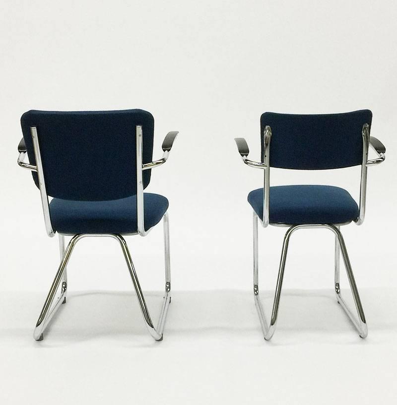  Office Chairs 212 Tubax Style by Gispen ,  1970s

Manufactured in the Netherlands
The chairs has bakelite armrest, chrome frame and blue fabric
Two different models
Model 1 measurements are 87 cm high, 48 cm wide and the depth is 45 cm (seat height