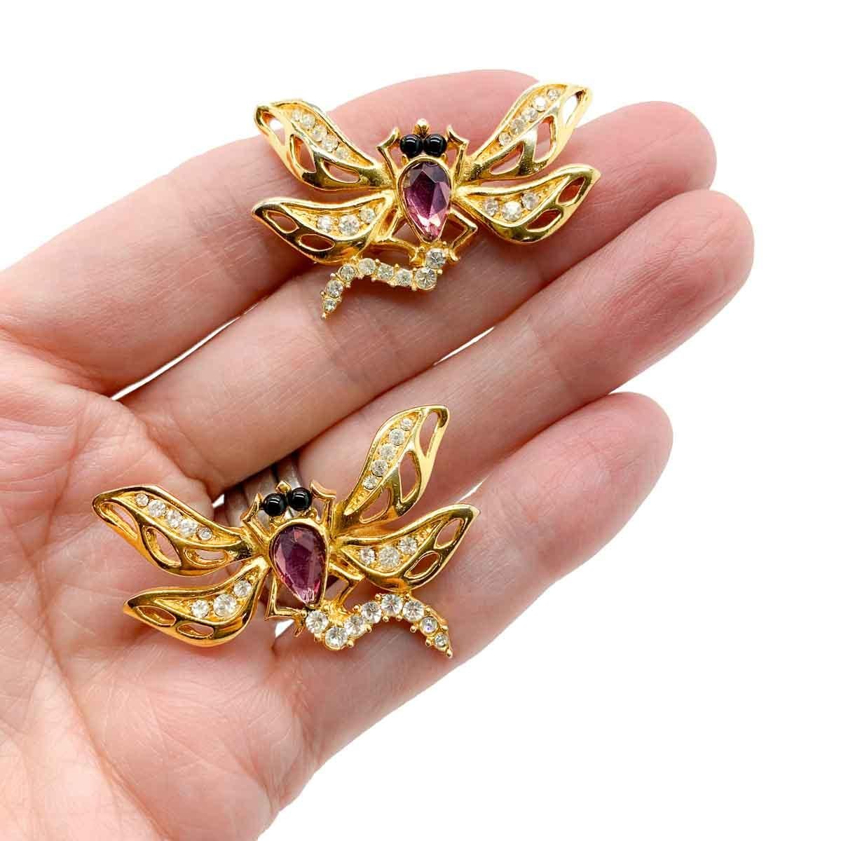 A pair of delightful vintage Givenchy dragonfly earrings. Featuring a dragonfly in flight with outstretched wings and embellished with black, amethyst and clear glass stones.
Vintage Condition: Very good without noteworthy wear.  Please note, the