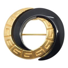 Vintage Givenchy Gilt 
Black Logo Brooch 1980s
