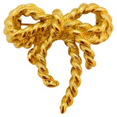Vintage GIVENCHY gold bow designer runway brooch