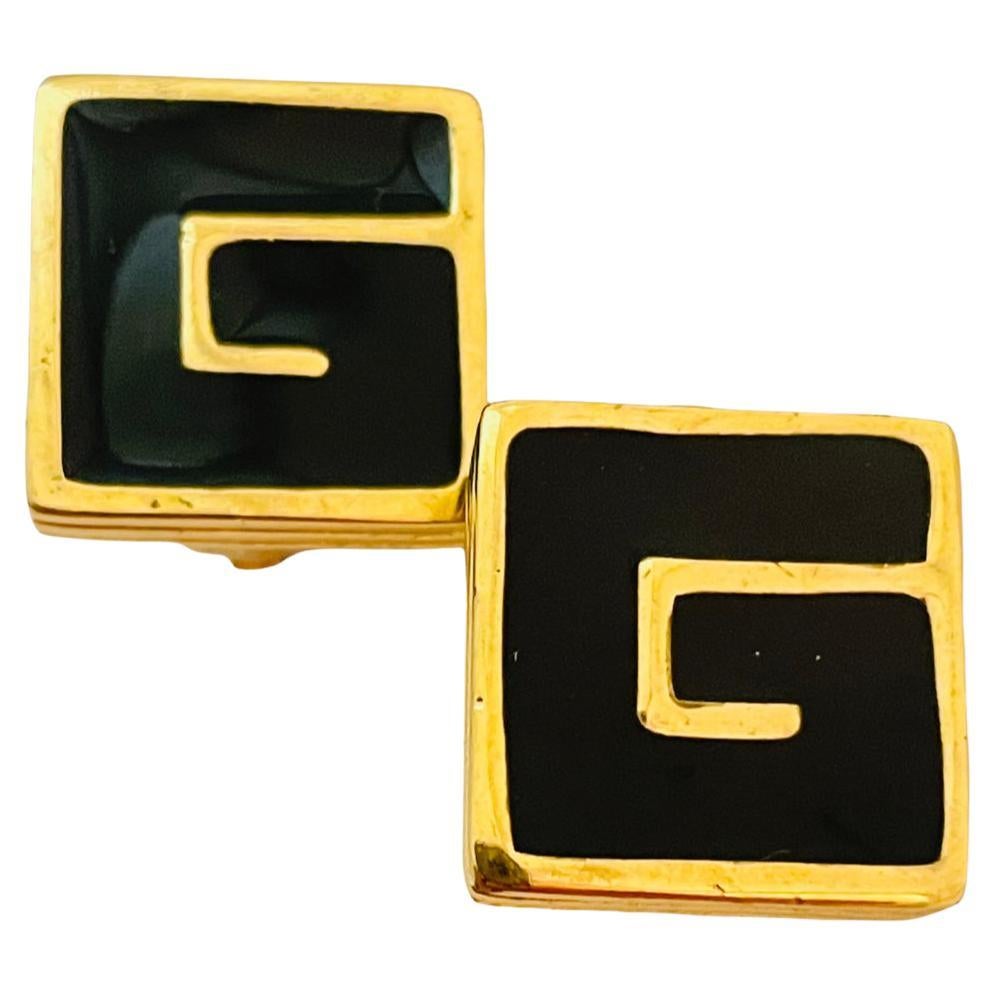 Vintage GIVENCHY gold G logo enamel designer earrings For Sale