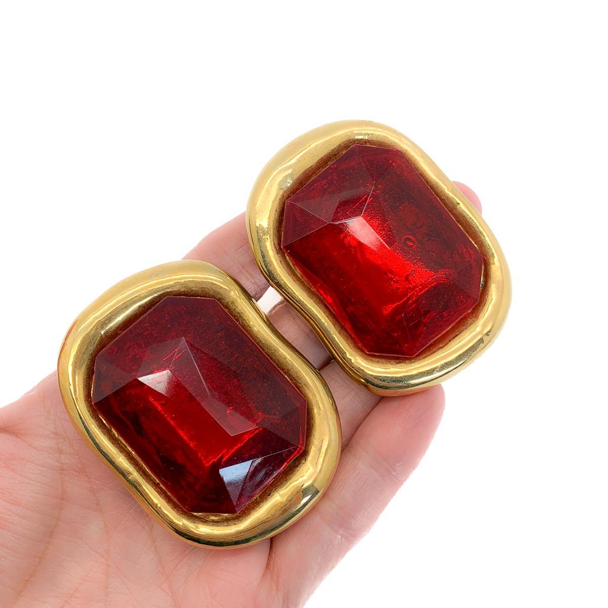 Huge Runway Vintage Red Givenchy Earrings. Featuring flowing metal mounts set with huge resin panels in vibrant red emulating faceted red stones. In very good vintage condition, signed, 5.6cms. Whilst the clips remain very strong on these earrings