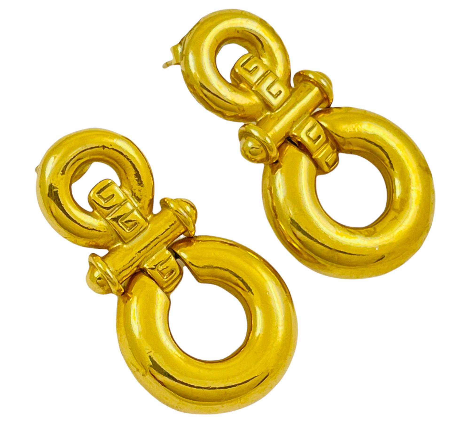 Women's Vintage GIVENCHY gold signed logo door knocker dangle designer runway earrings