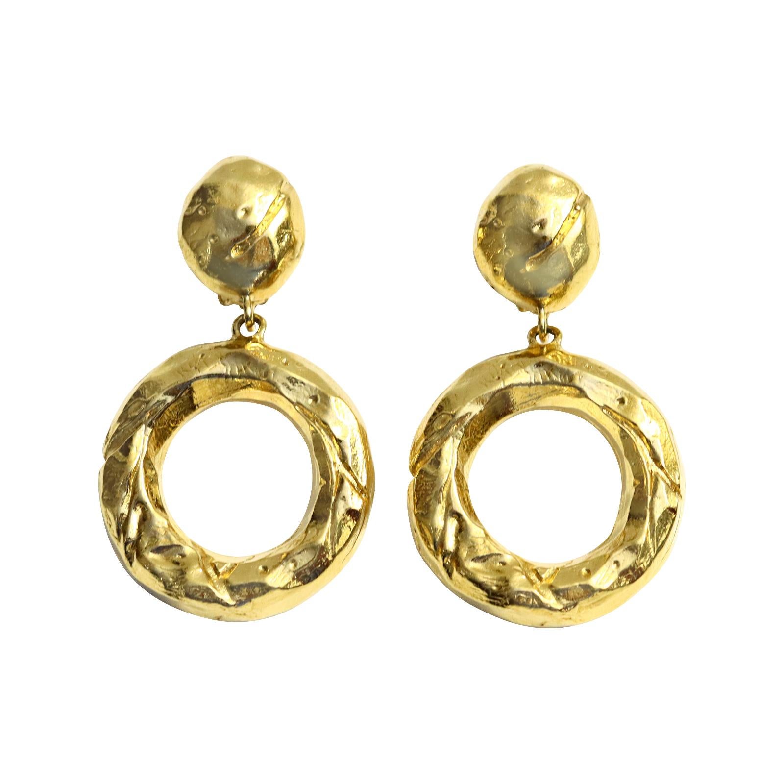 Artist Vintage Givenchy Gold Tone Textured  Dangling Hoop Earrings Circa 1990s