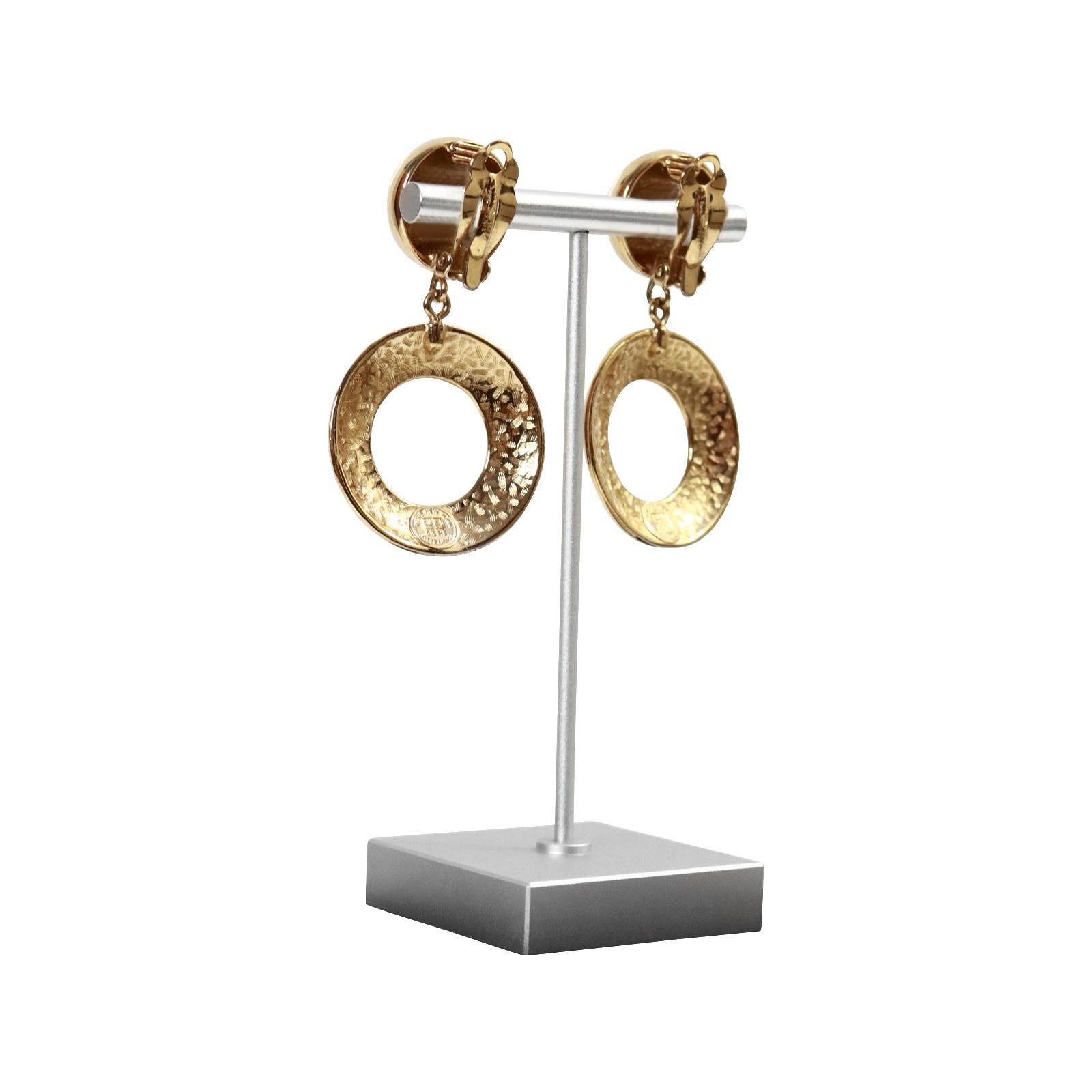Vintage Givenchy Gold Tone Textured  Dangling Hoop Earrings Circa 1990s In Good Condition For Sale In New York, NY