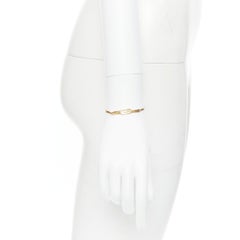 vintage GIVENCHY graphic G id plate gold chain short bracelet