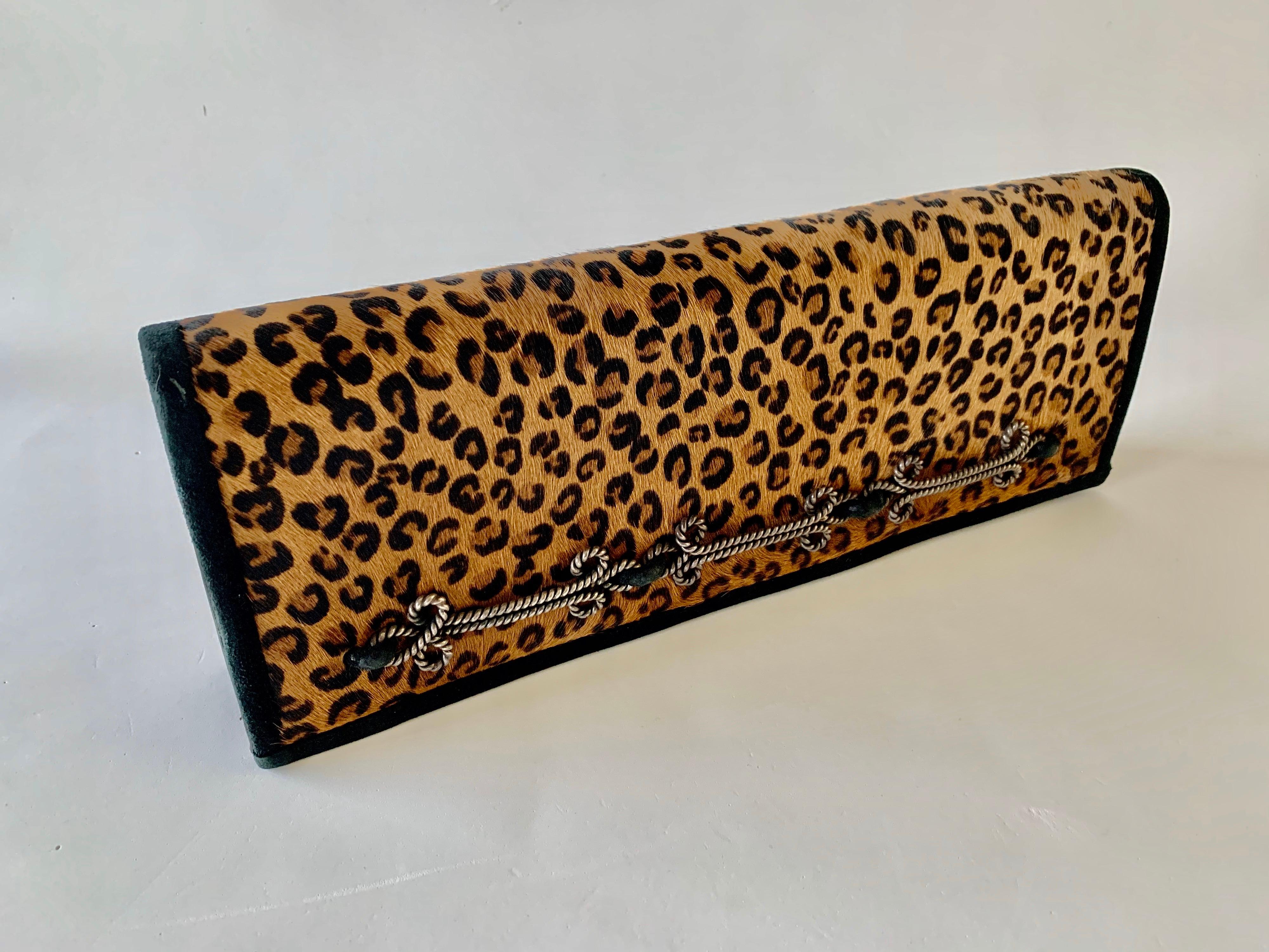 Scarce vintage Givenchy, Paris, haute couture leopard envelope clutch - handcrafted the clutch features a color blocking technique which is comprised out of the finest pony hair and leather, in an elongated envelope shape. The piece is accented by