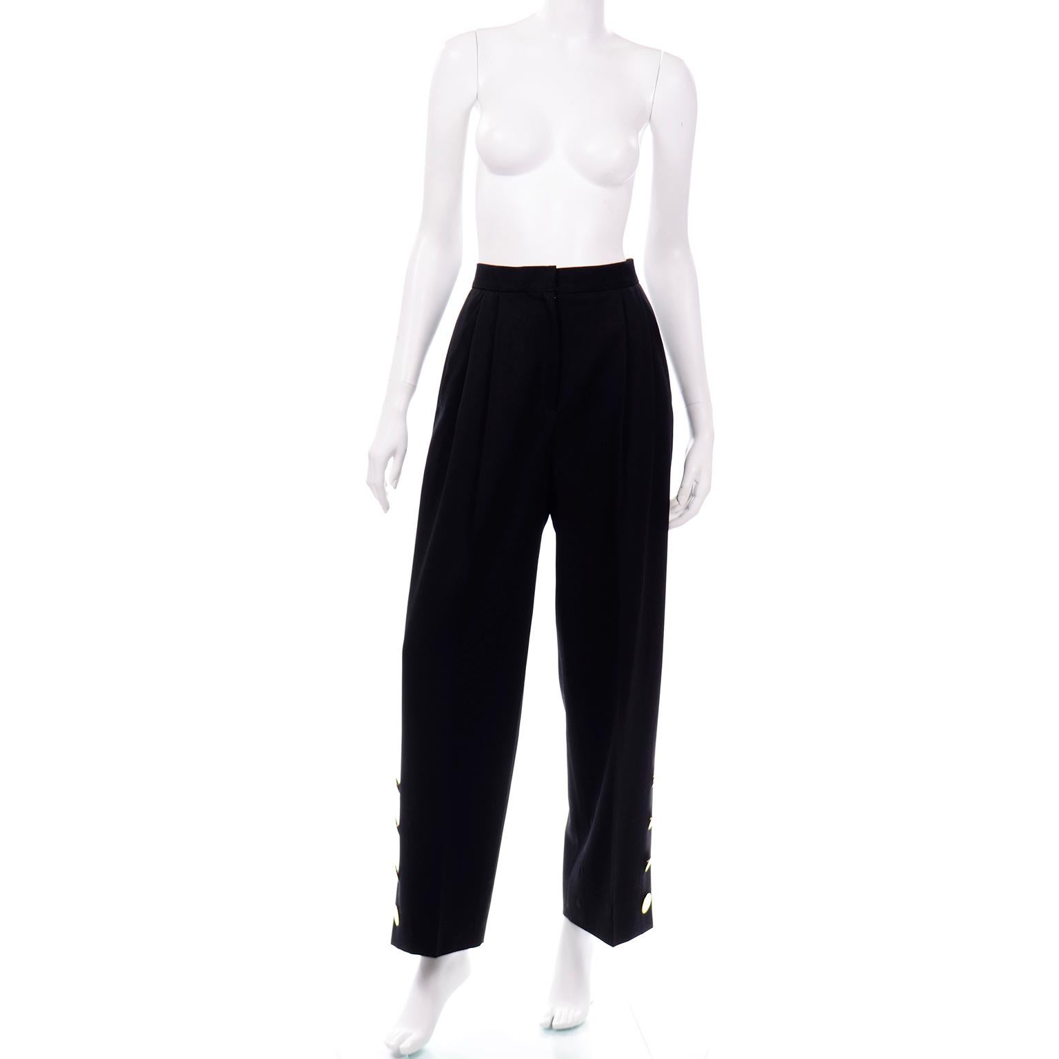 This is a pair of amazing vintage Givenchy high waisted black trousers. Vintage 1980's and 1980's pants make great additions to any modern wardrobe! We love the unique detail on these particular pants of large gold tone buttons on the sides of the