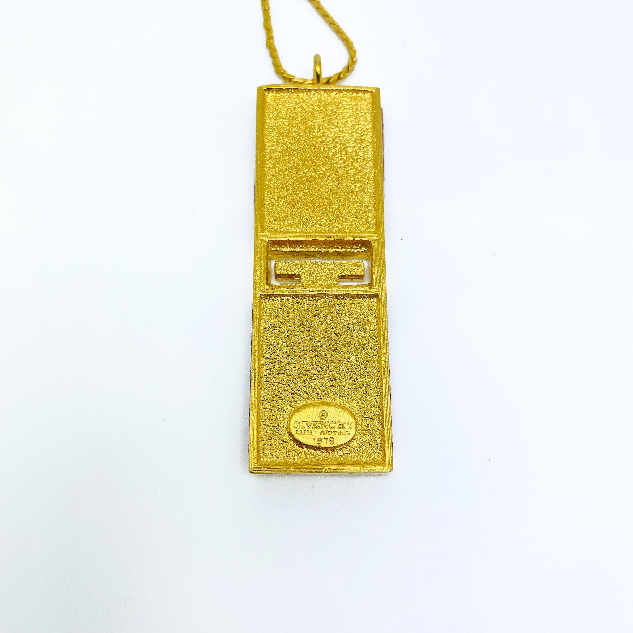 Collier pendentif vintage Givenchy en plaqué or (années 1970 - 1979) Pour femmes en vente