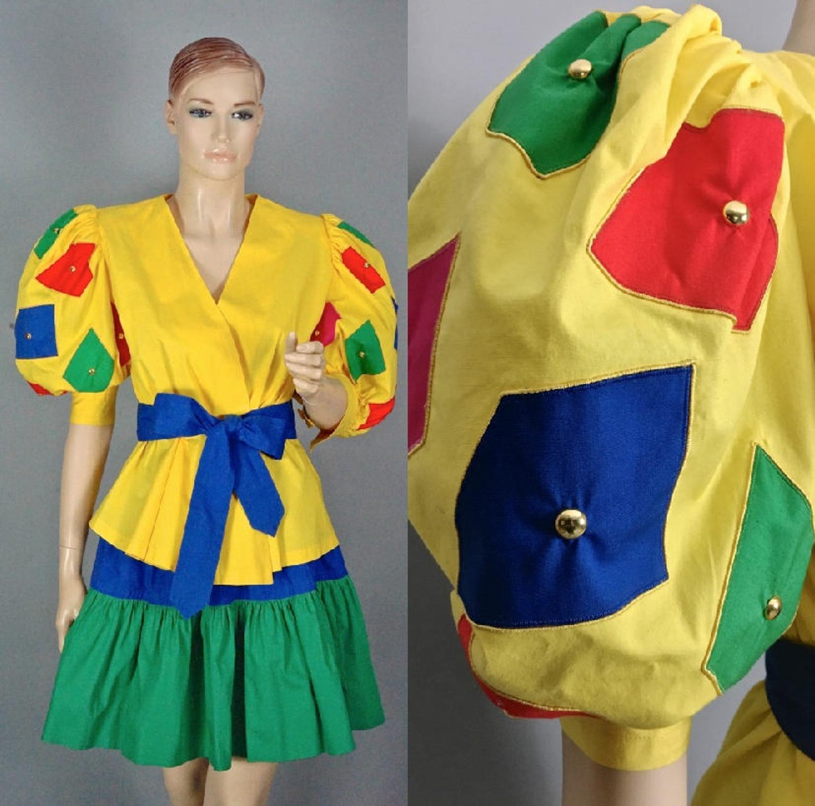 Vintage GIVENCHY NOUVELLE BOUTIQUE Color Block Balloon Sleeves Blouse Skirt Suit Ensemble

Measurements taken laid flat, please double bust, waist and hips:
BLOUSE
Shoulder: 14.96 inches (38 cm)
Sleeves: 18.11 inches (46 cm)
Bust: 16.53 inches (42