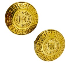 Vintage GIVENCHY Paris New York gold signed logo designer runway clip earrings