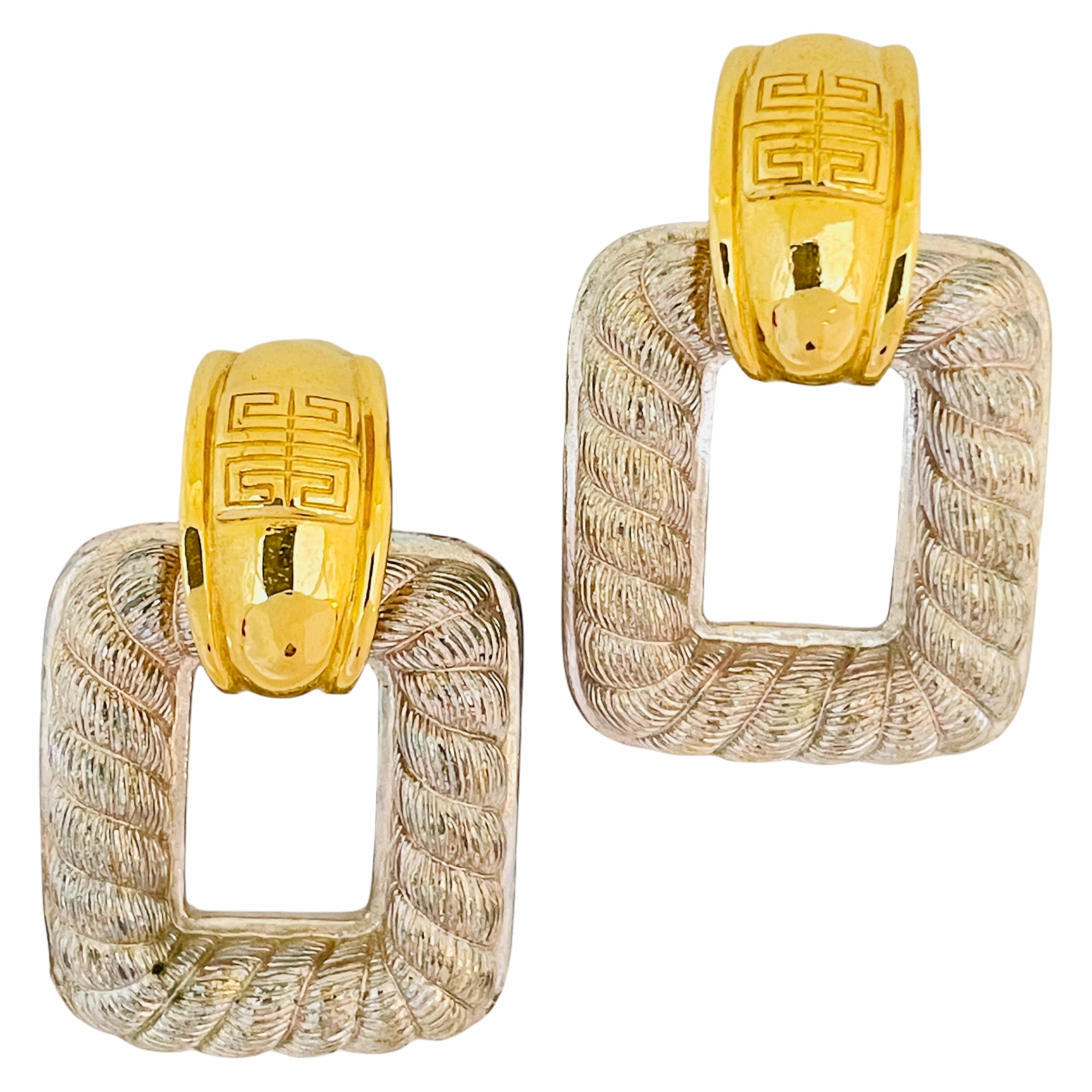 DETAILS

• signed GIVENCHY Paris New York

• gold and silver tone  

• vintage designer runway earrings 

MEASUREMENTS 

• 1.75 