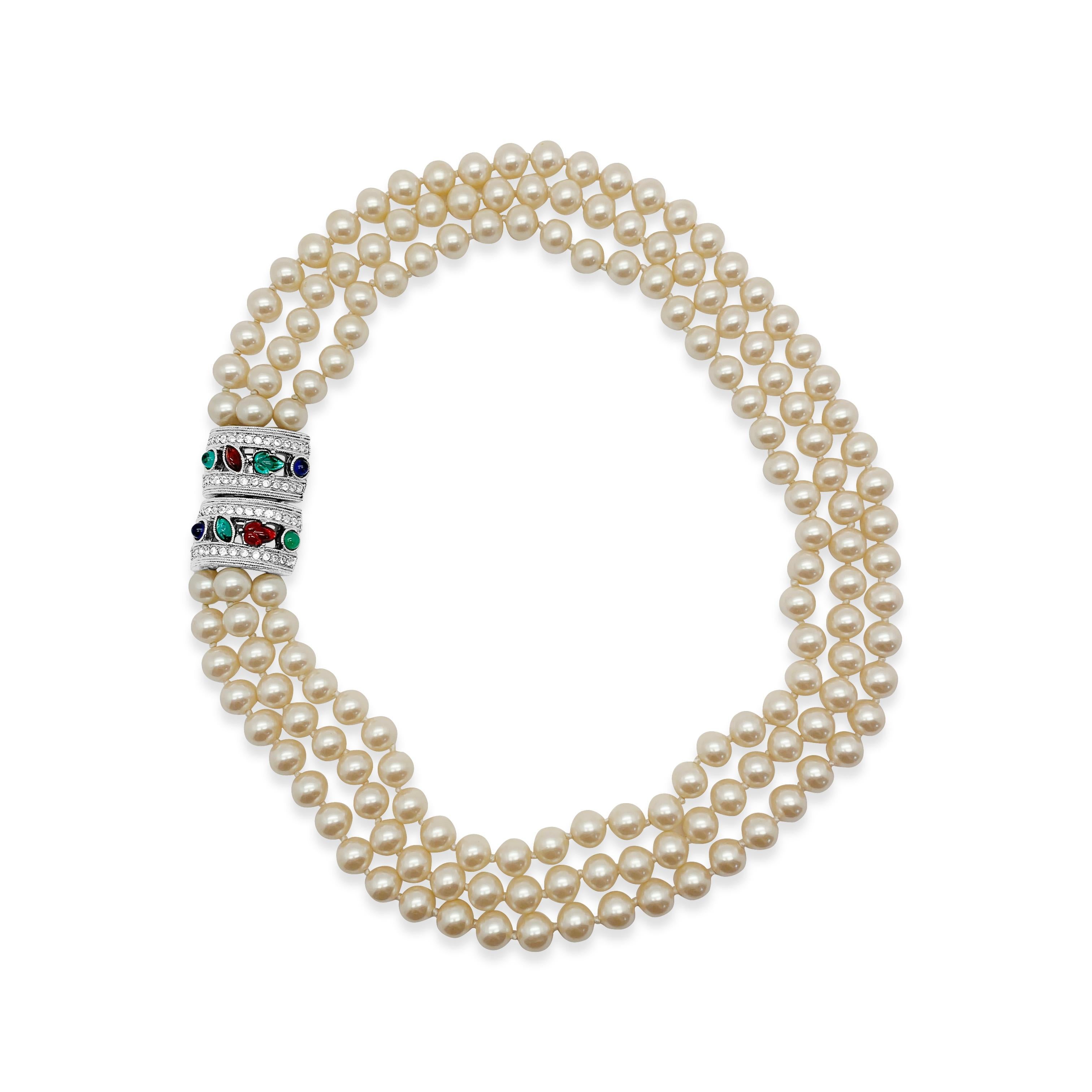 A stand-out Vintage Givenchy Tutti Frutti Necklace. Crafted in silvertone metal with glass pearls and coloured glass. Featuring a trio of stunning individually knotted pearl strands culminating in the most beautiful art deco inspired 'Tutti Frutti'