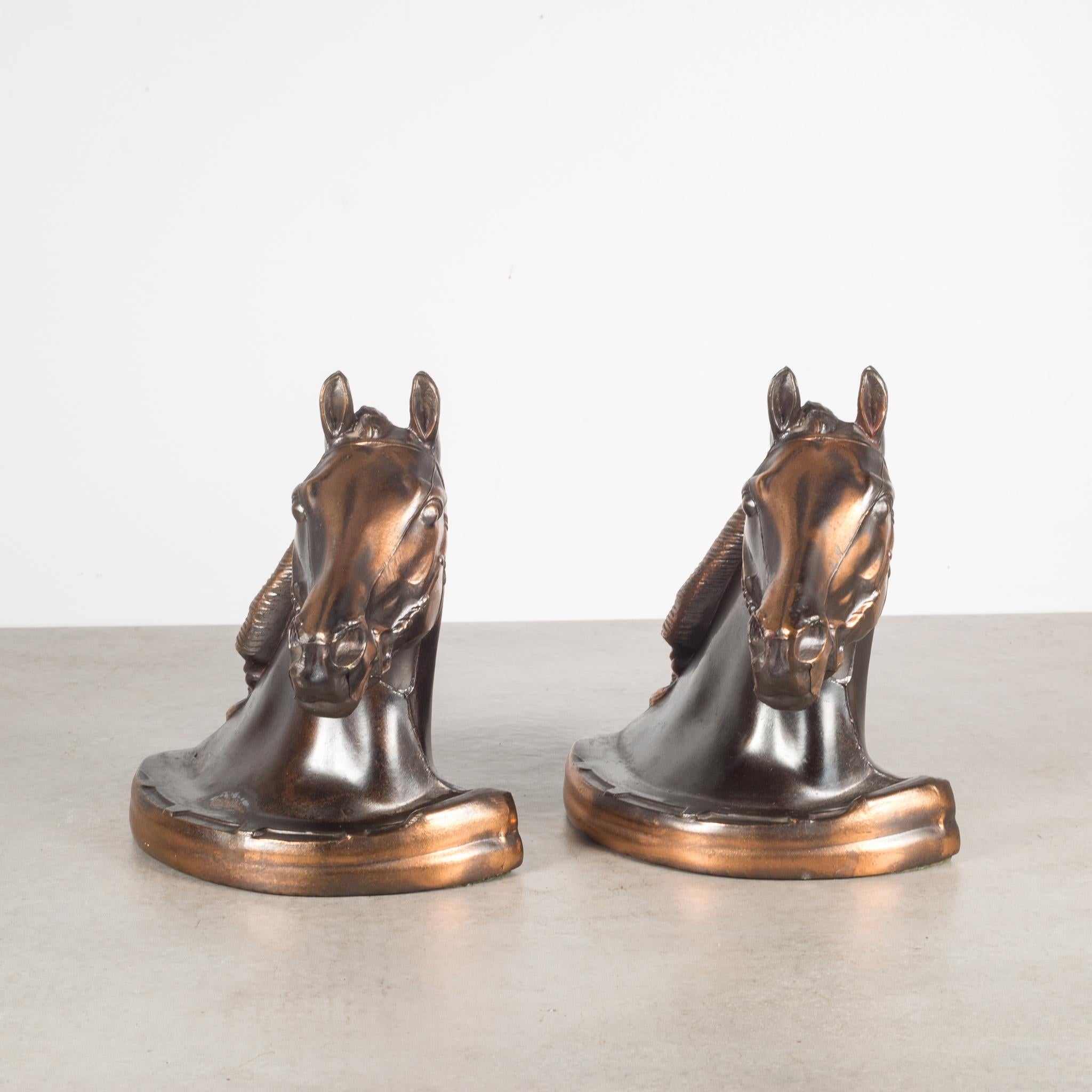 About

An original pair of Gladys Brown style metal horse head bookends with bronze and copper plate and original felt on the bottom.


