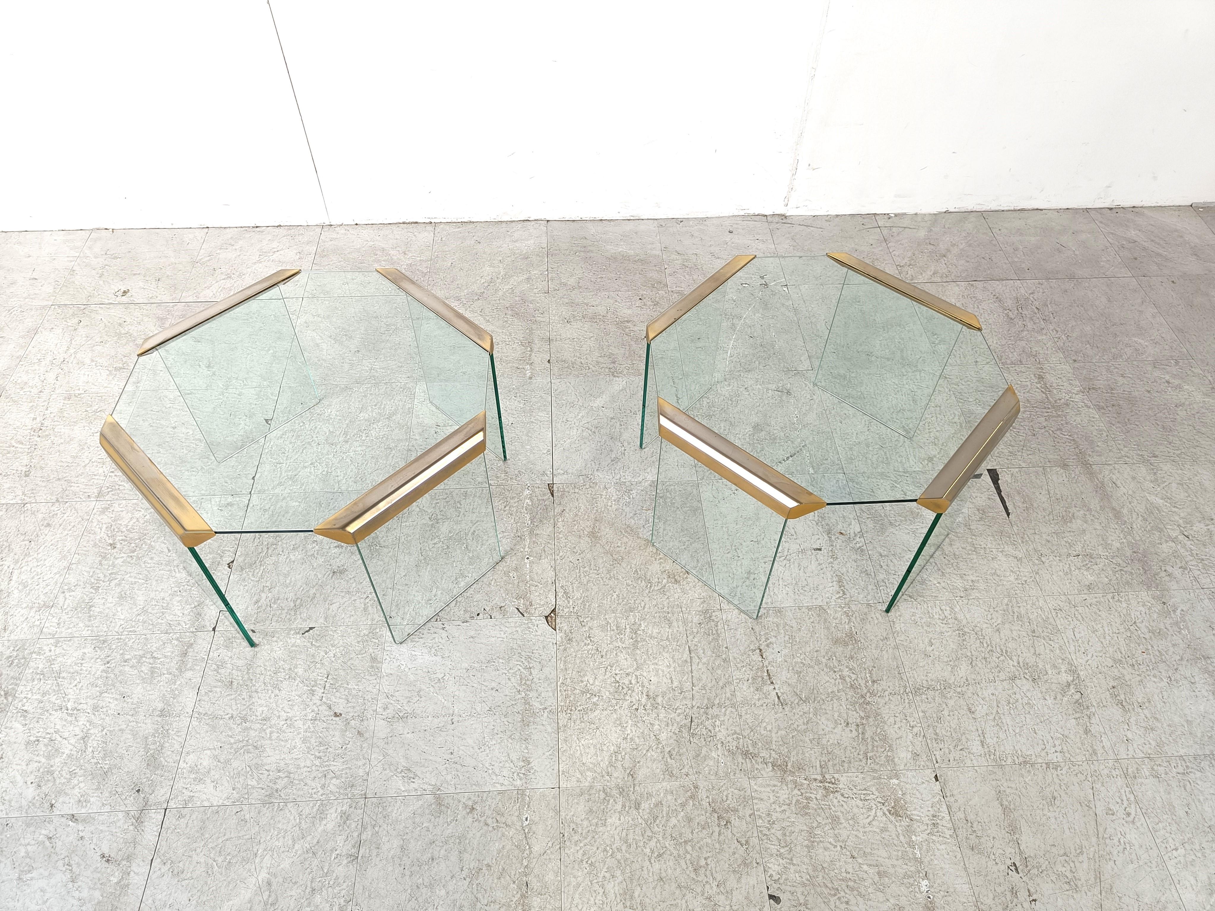 Gorgeous pair of glass and brass side tables or coffee tables with a glass tops and glass legs.

Good overall condition with some normal age related scratches which are not disturbing.

1980s - Belgium

Dimensions:
Height: 37cm/14.56