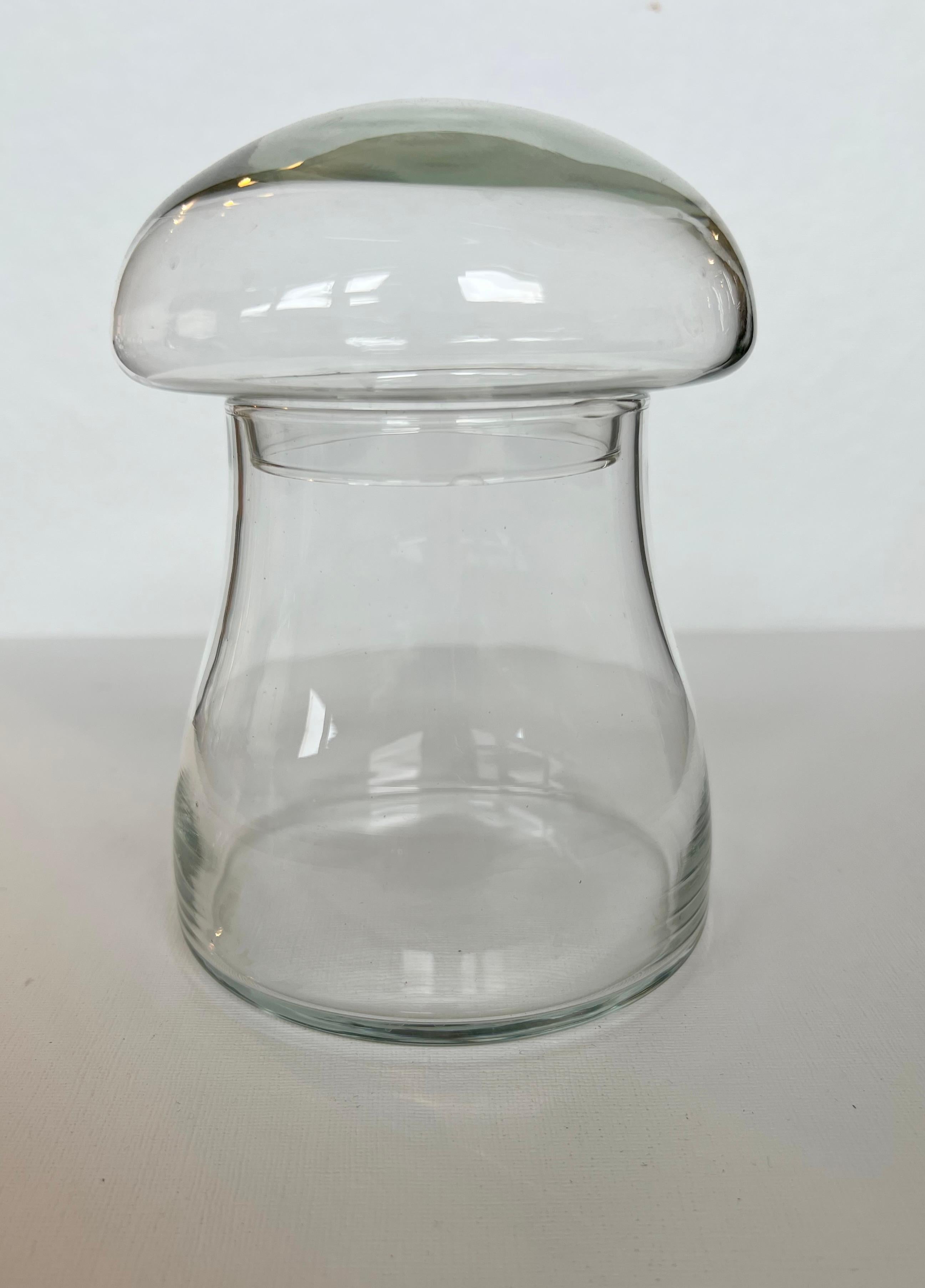 Sweetest vintage glass jar in the shape of a mushroom, circa 1960s-1970s made by Libbey Glass Co.  The lid is removable and fits snuggly on the jar.  It would make a beautiful terrarium.
