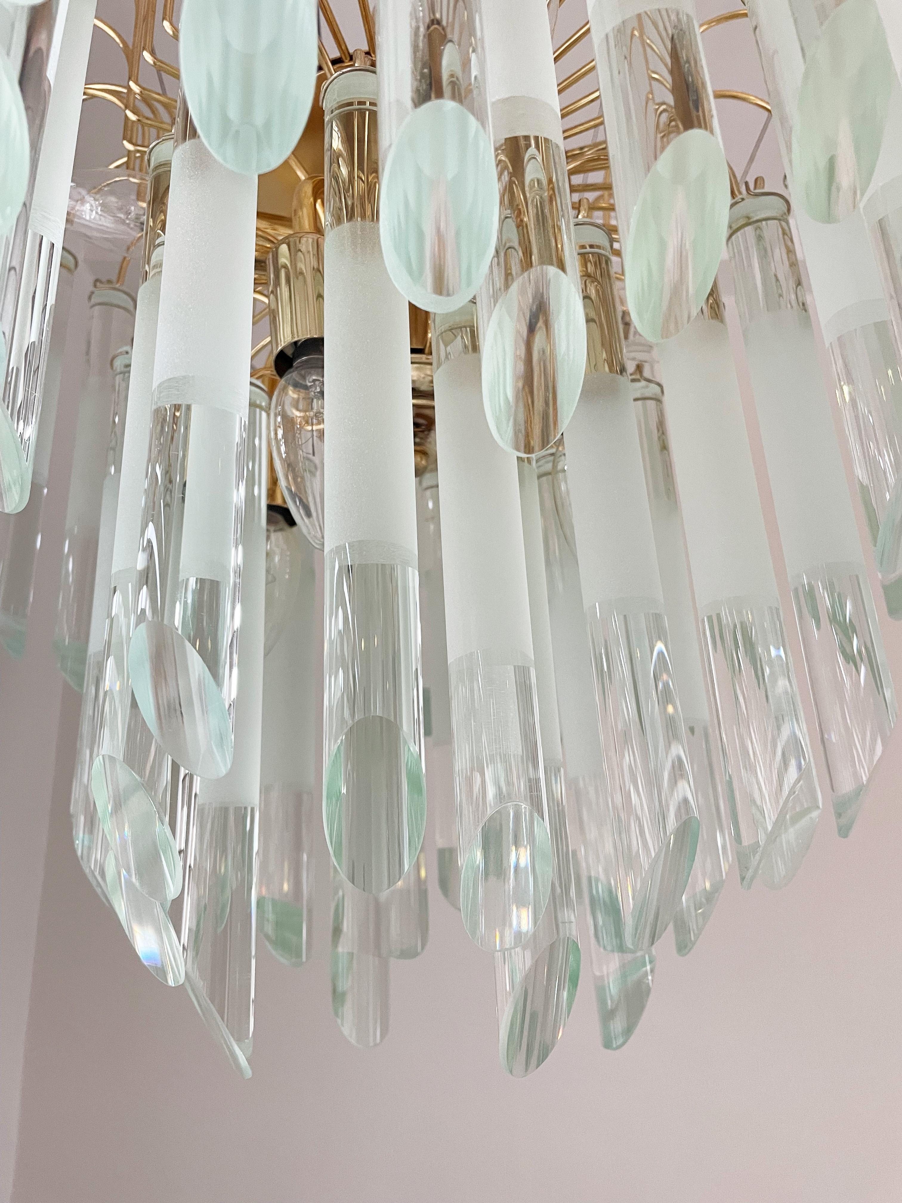 Striking chandelier in the manner of Paolo Venini with cut glass droplets with matte parts.

The chandelier emits a spectacular light and is in good condition.

It takes 8 E14 edison light bulbs.

1970s- Italy

Dimensions:
Height: