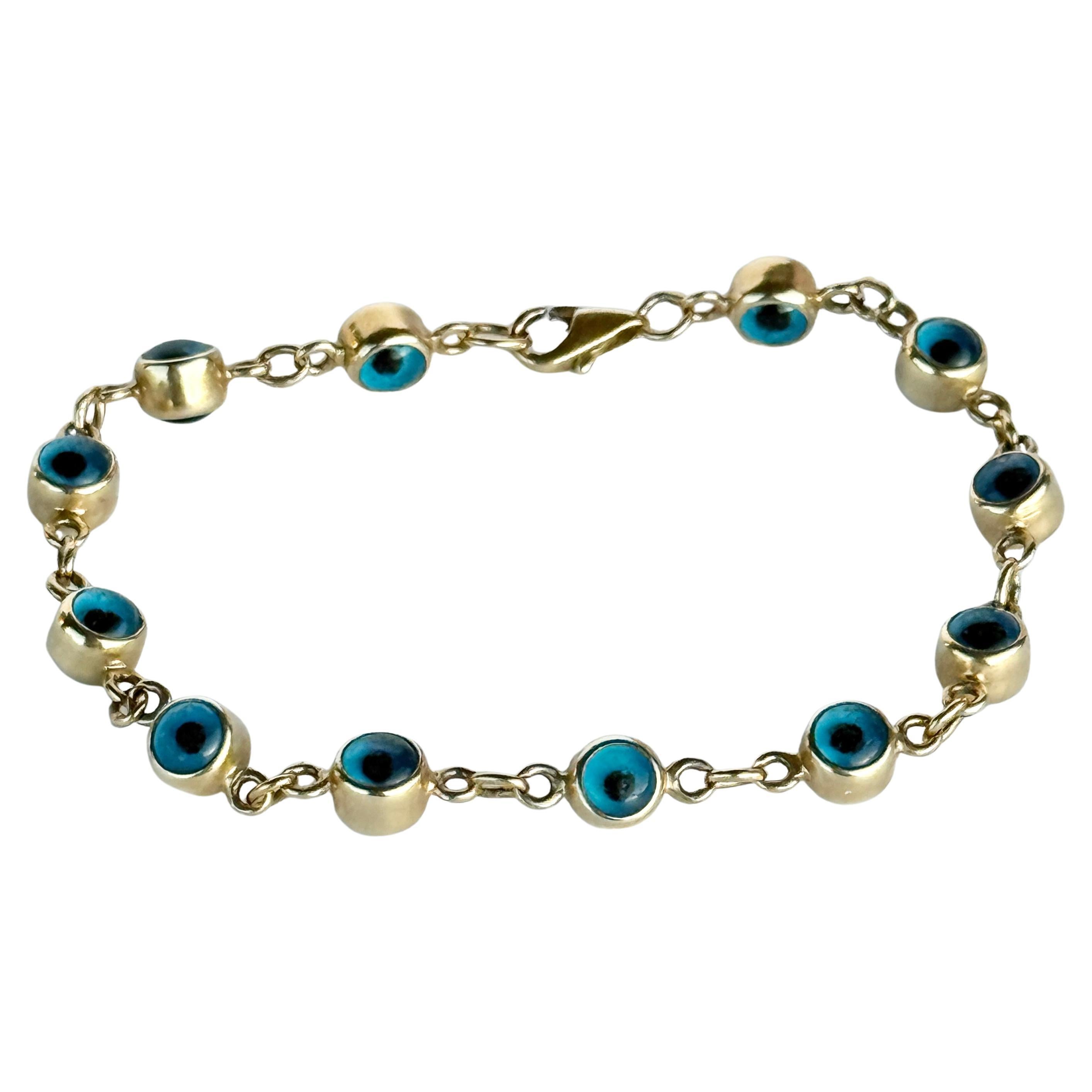 Pulsera vintage de cristal con mal de ojo y oro de 14 quilates