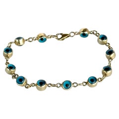 Bracciale in vetro vintage con malocchio e oro 14 carati