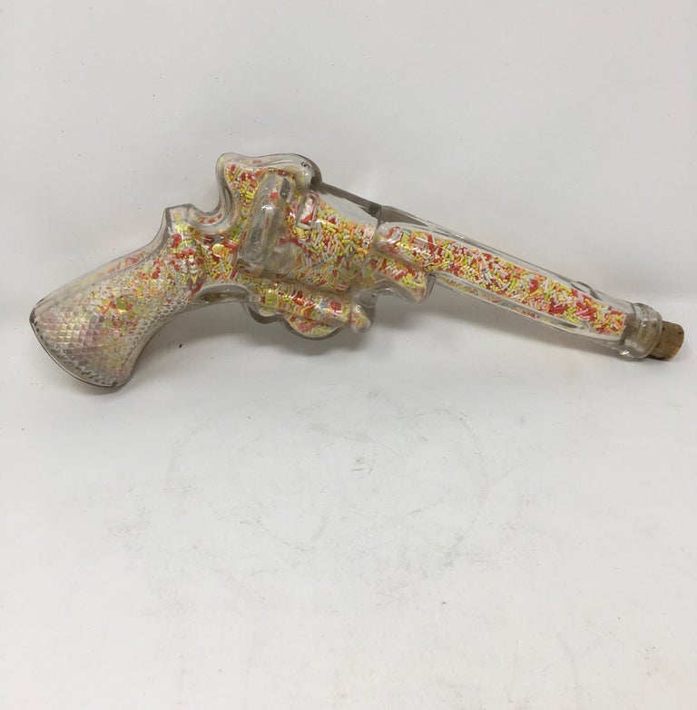 Vintage Glass Gun Candy Dispenser For Sale at 1stdibs