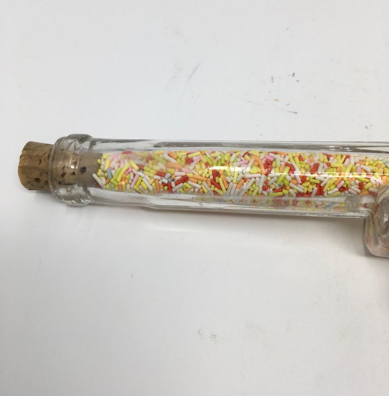 Vintage Glass Gun Candy Dispenser For Sale at 1stdibs
