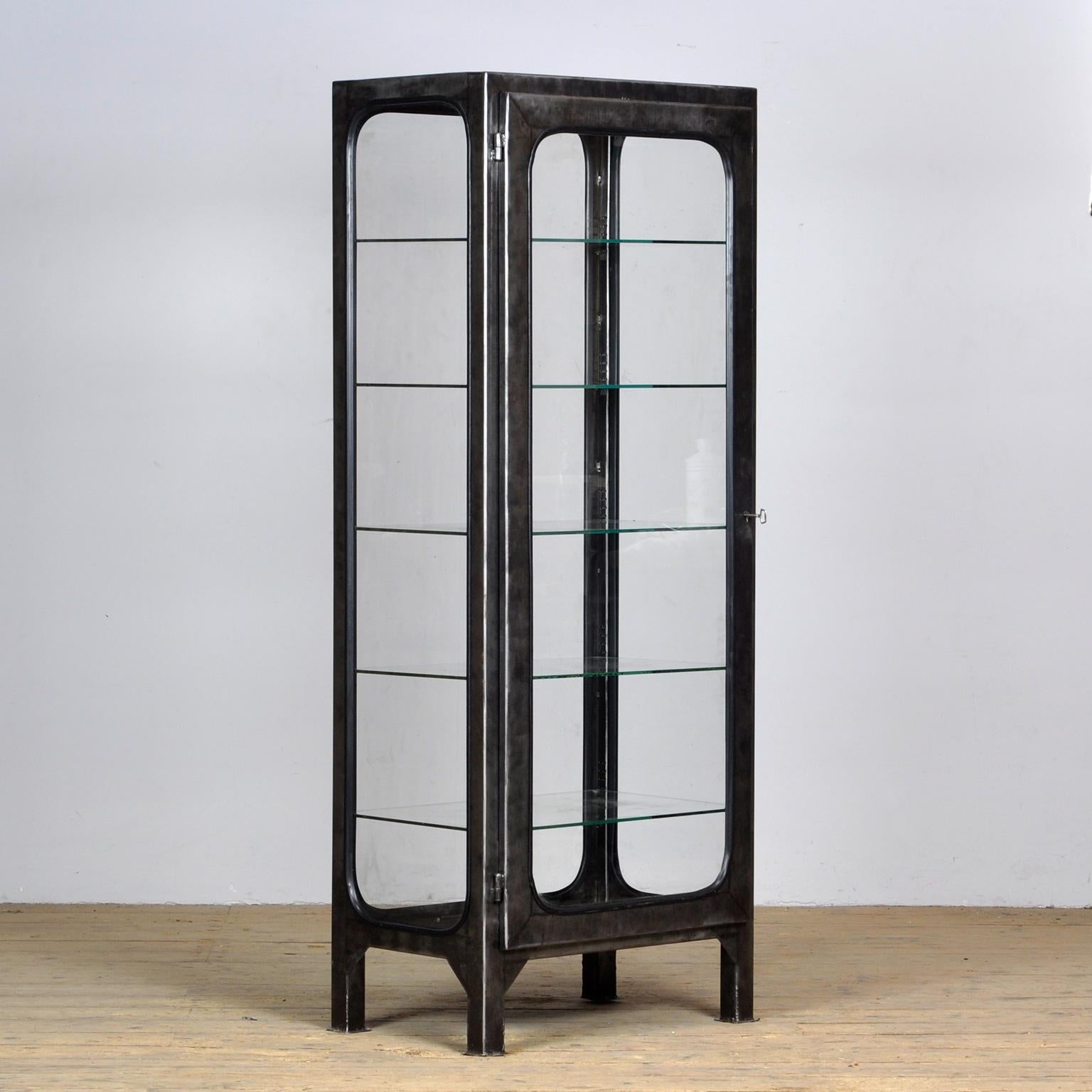 iron and glass cabinet