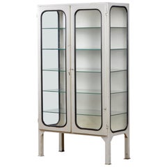 Cabinet médical vintage en verre et fer:: 1970