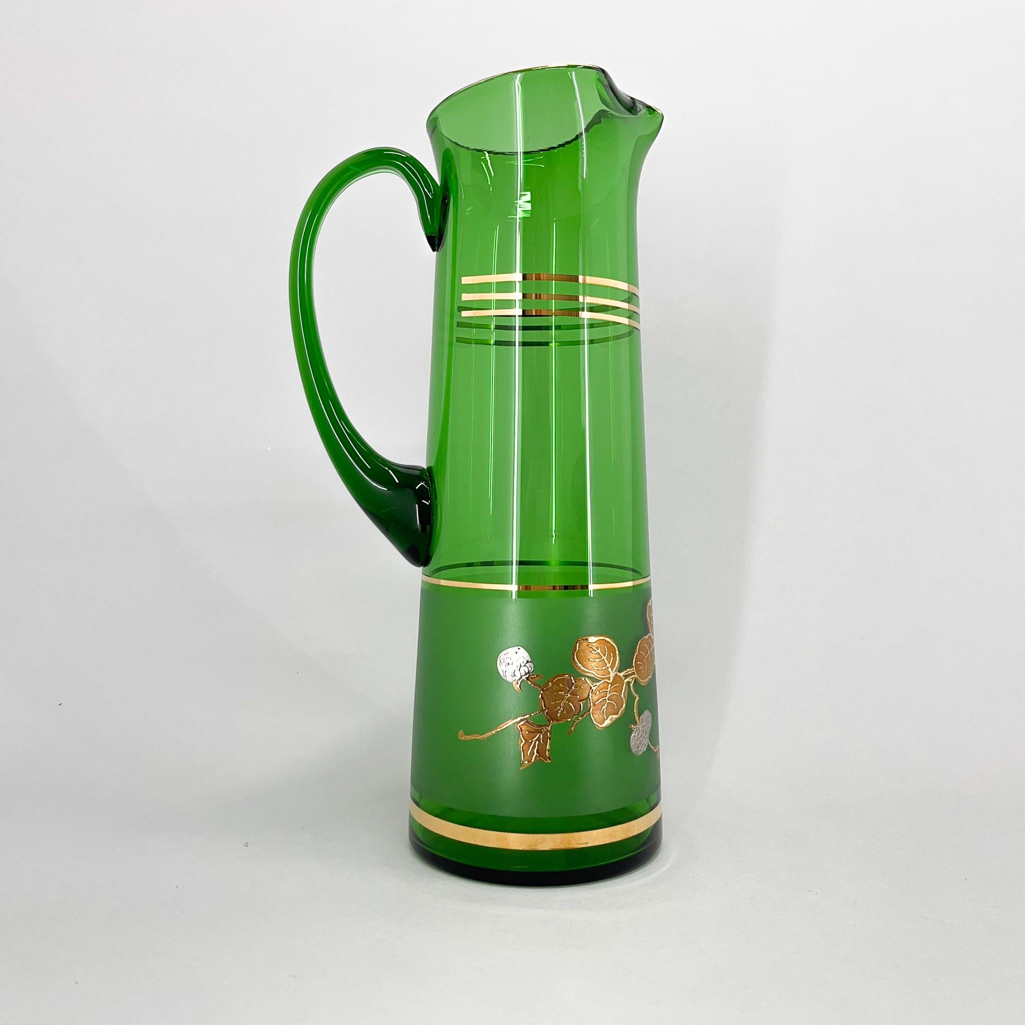 Midcentury tall green glass jug with golden decor. Made in former Czechoslovakia in the 1970s.