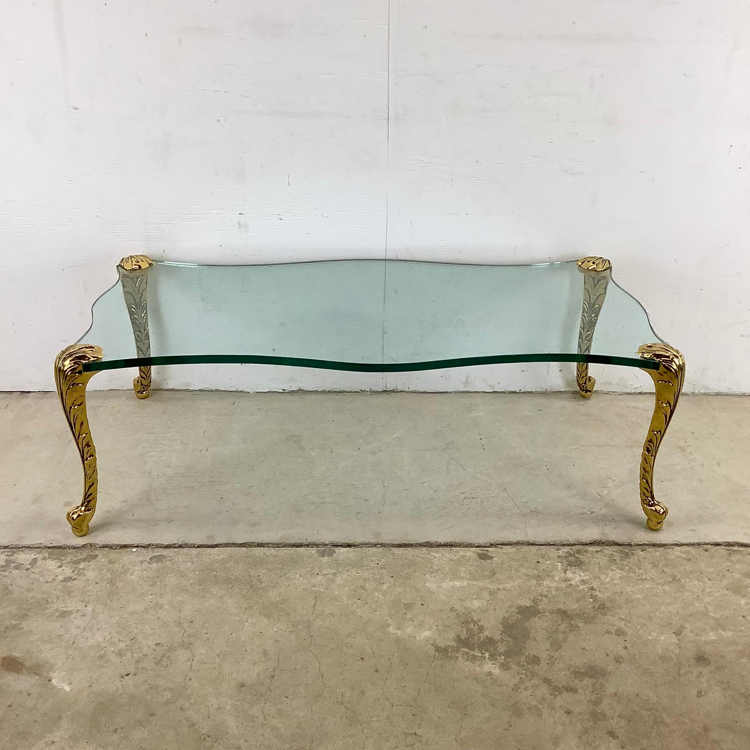 Introducing this vintage P.E. Guerin-Style Gilt Coffee Table, a luxurious and captivating piece that will add a touch of elegance and grandeur to your living space.

In the style of P.E. Guerin, a renowned French bronze manufacturer, this coffee