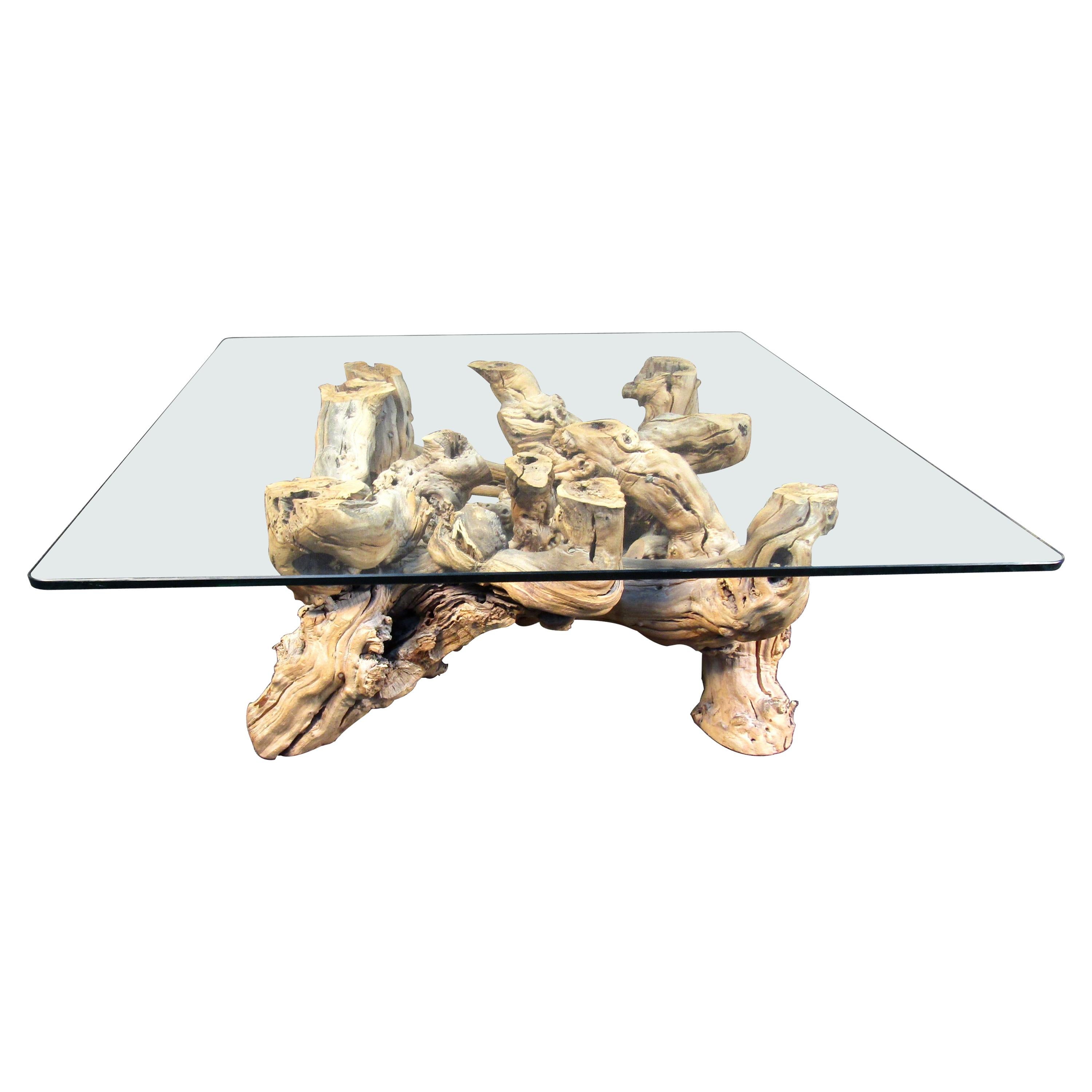 Table basse vintage en bois flotté avec plateau en verre en vente