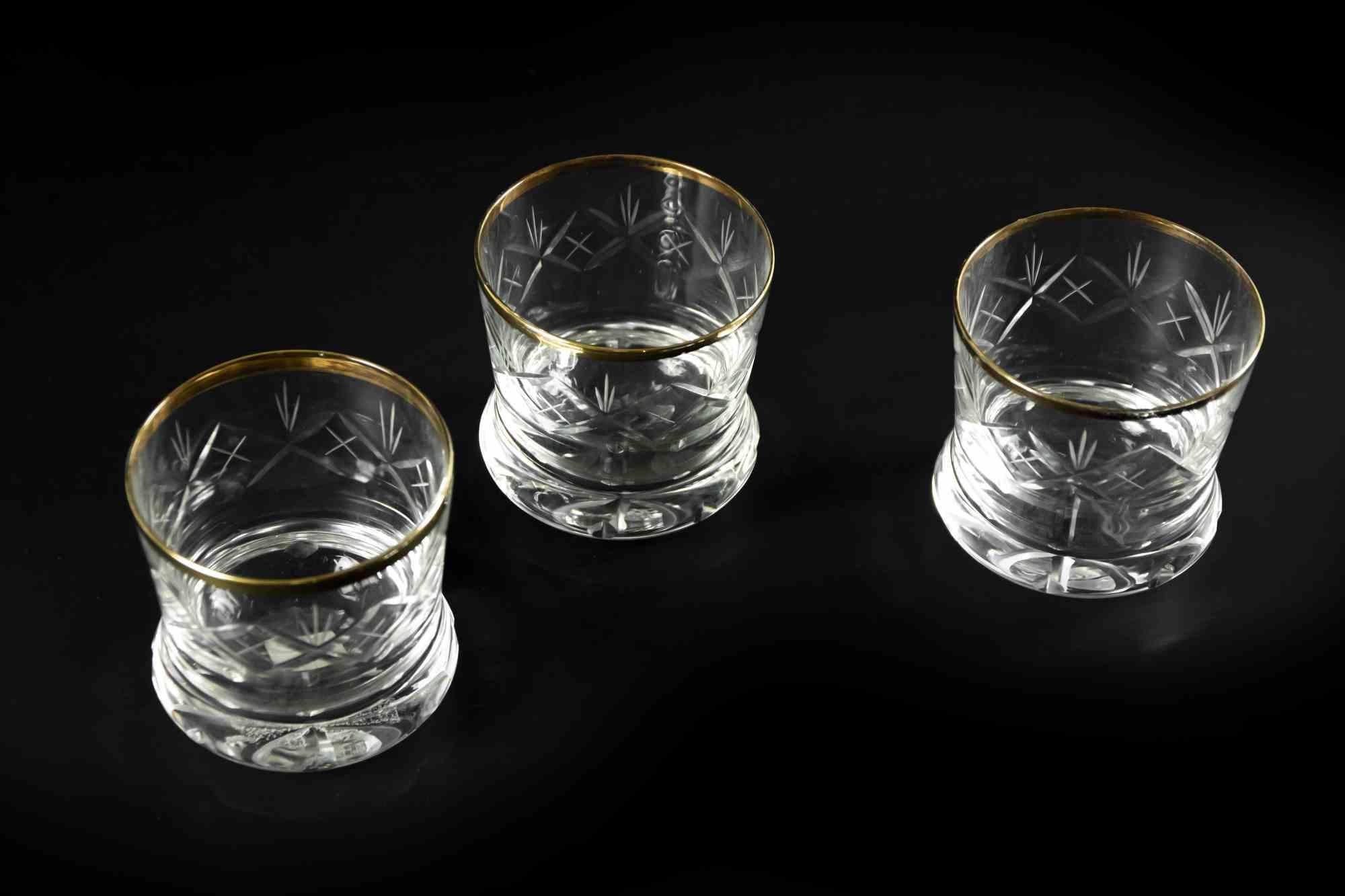 Set of three vintage glasses realized in Europe the half of 20th century.

 A beautiful set of three glasses with gilded edges.