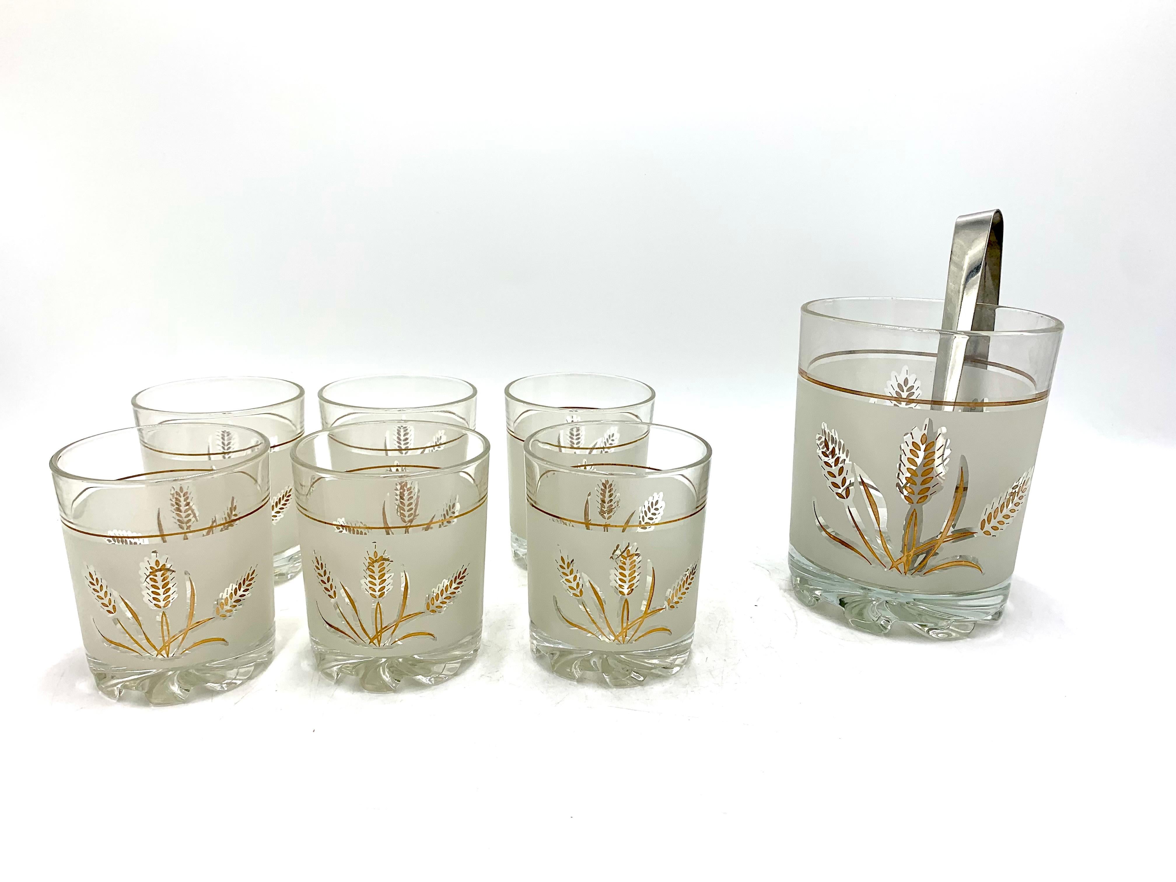 Vintage set of six glasses with cooler and ice tongs
Produced in Poland in the 1990s. 
* Not proper for dishwasher or microwave. 
Very good condition, without any damage 
cooler : height 14cm, diameter 11cm
glasses : heught 9cm, diameter 8cm.