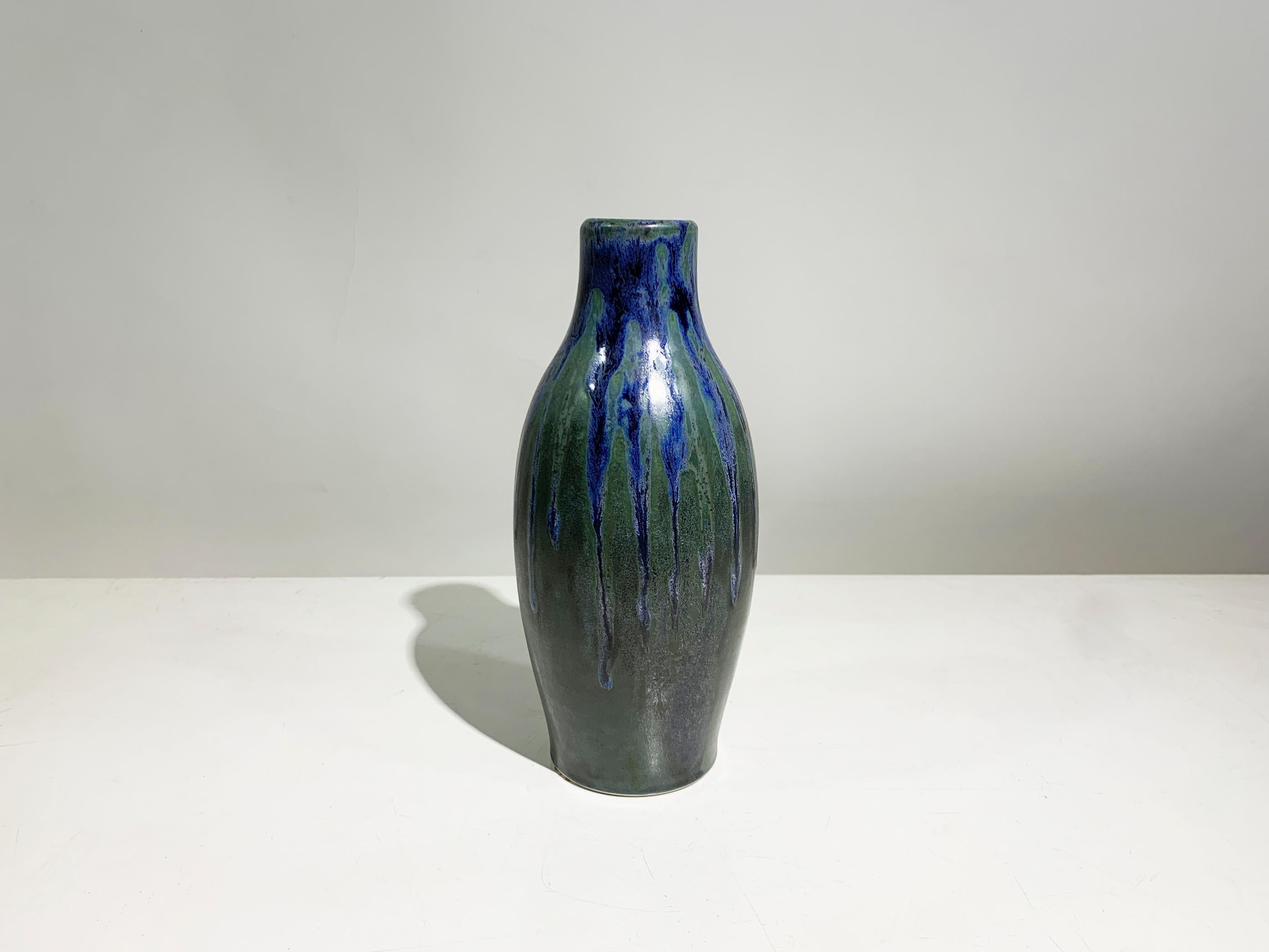 This captivating studio pottery vase is a testament to the artistic innovation and craftsmanship of the renowned Boch Frères Keramis factory, a leading Belgian ceramics producer. Clearly signed 