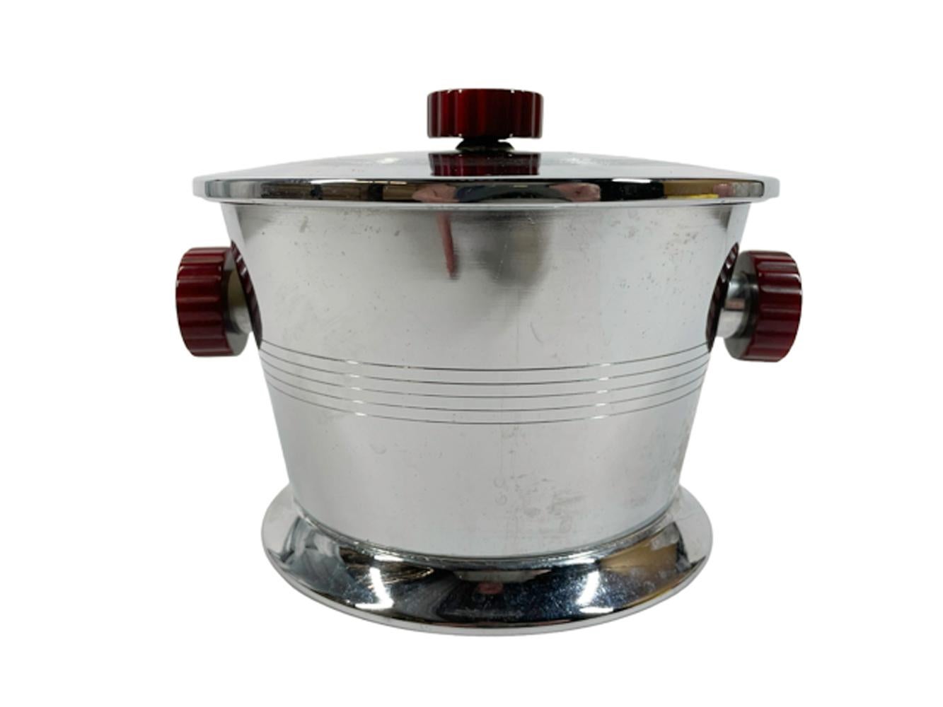 Vintage Glo-Hill lidded ice bucket in chrome with mottled red and black faux tortoiseshell Bakelite handles.